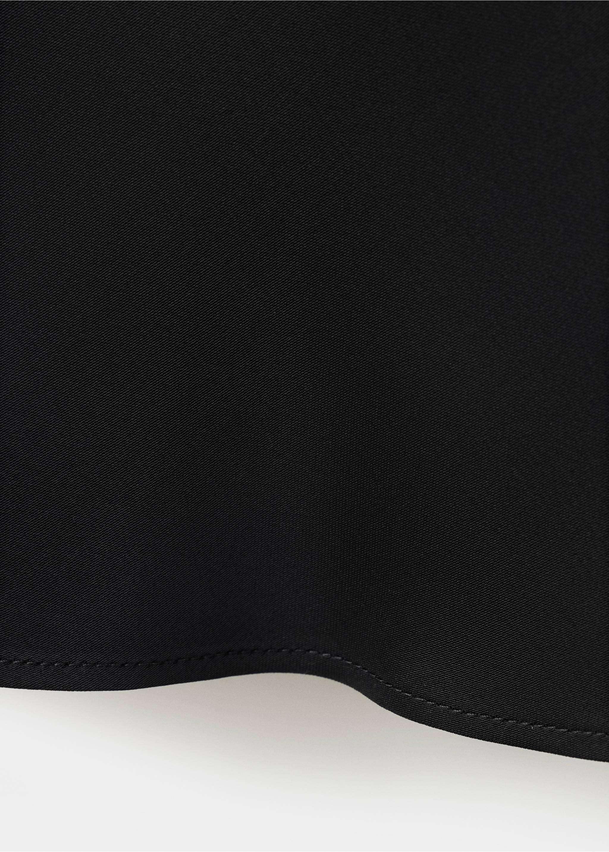 Close-up fabric texture detail of the black dress., Black. Ref: 37079142-00.