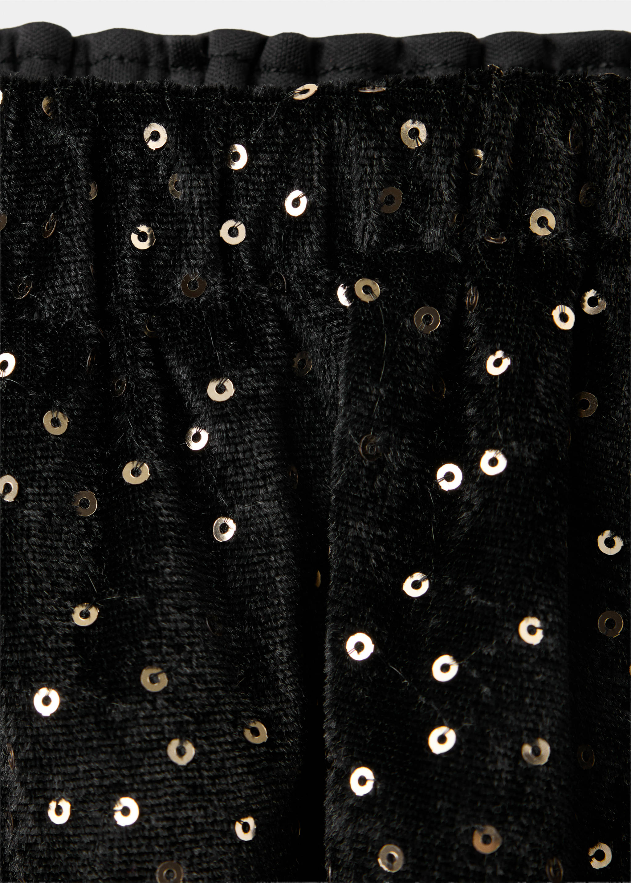 Close-up of a black velvet skirt with silver sequins and elastic waist., Black. Ref: 37079208-00.