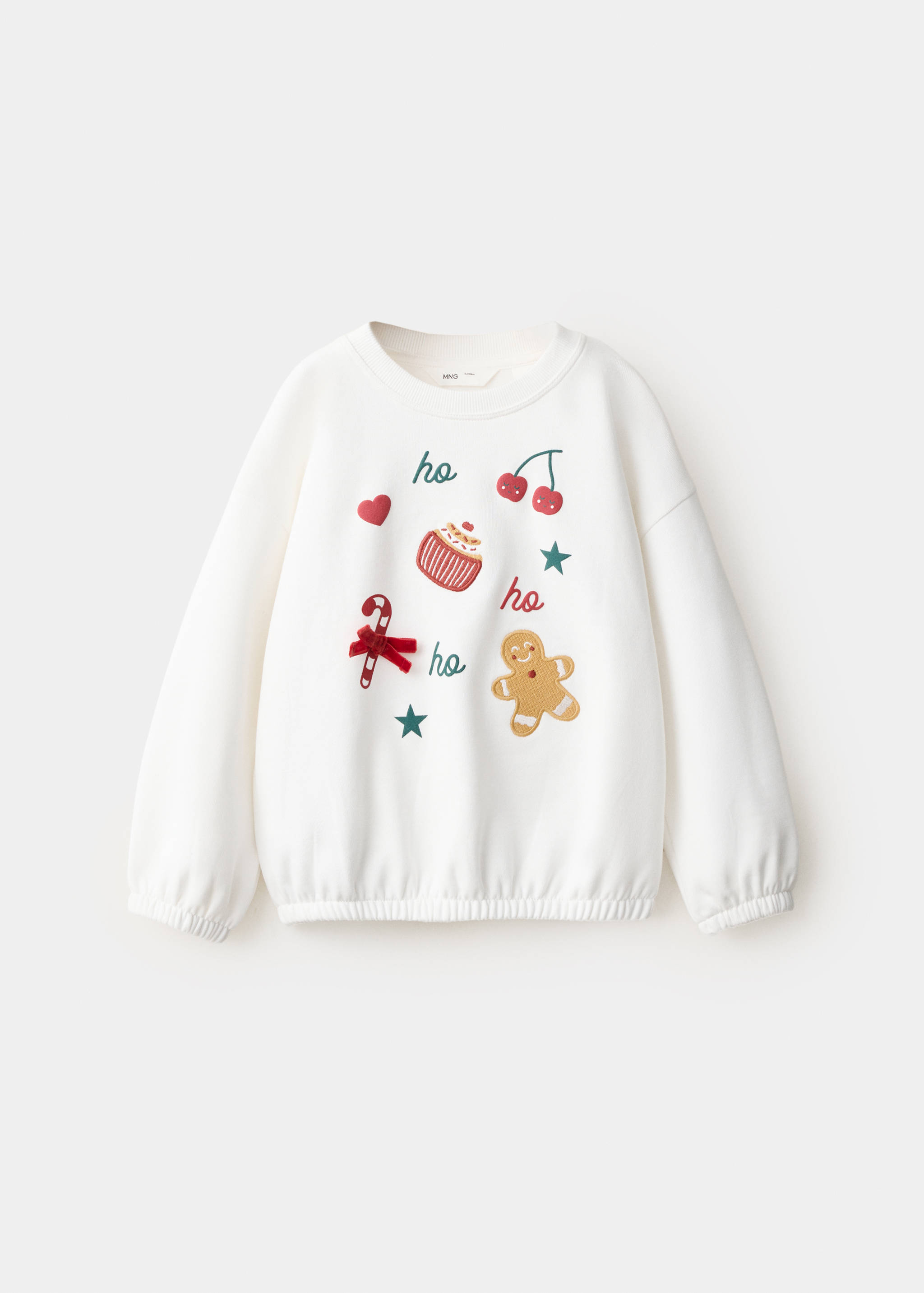 Sudadera infantil en color blanco roto con parches y estampados festivos.