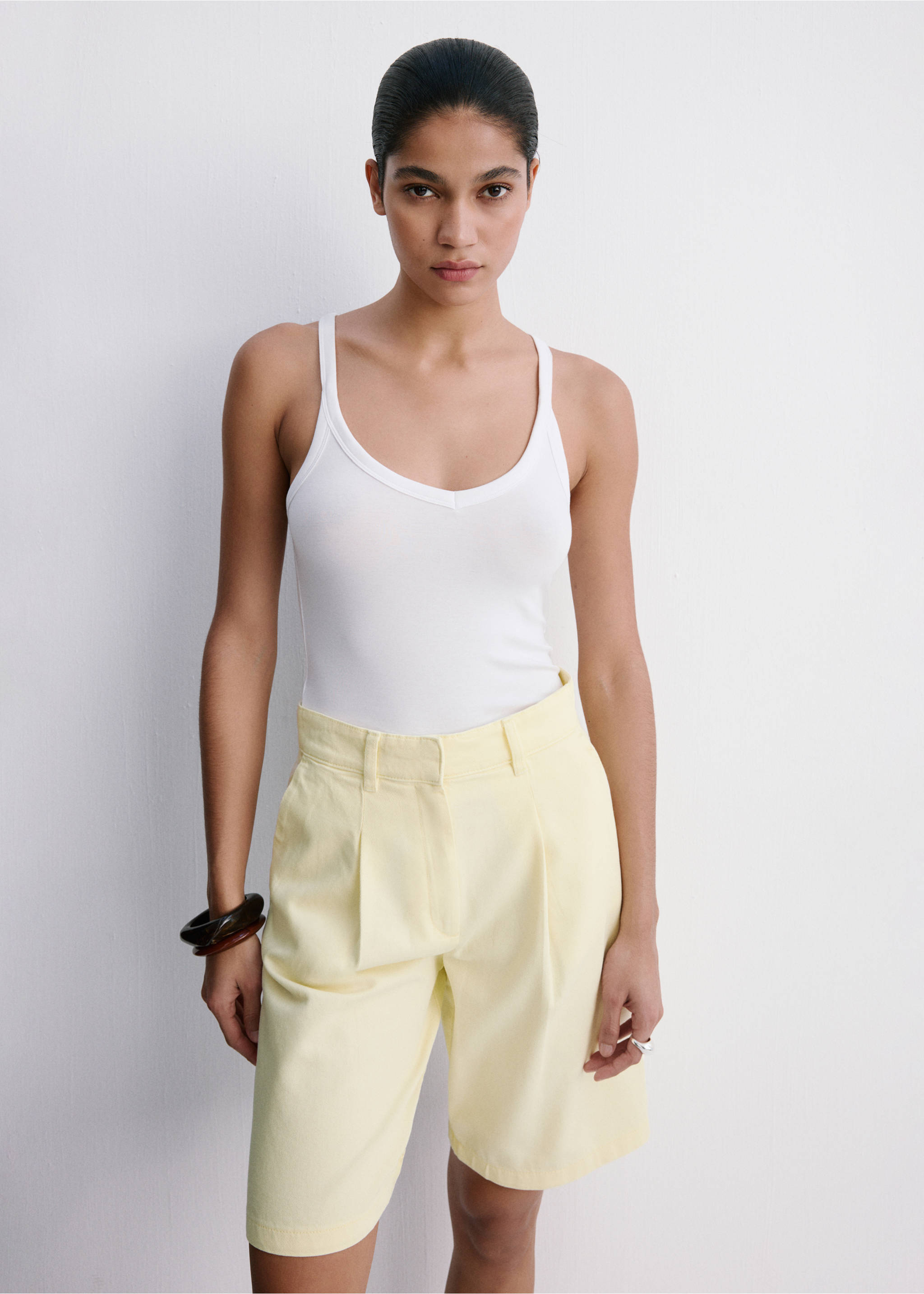Straight Bermuda shorts with buckle detail - Medium plane, Pastel Yellow. Ref: 37081410-00.