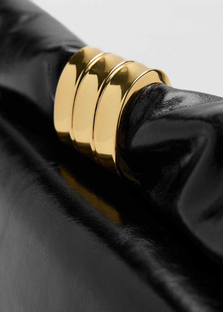 Leather clutch bag with metallic appliqué — Black
