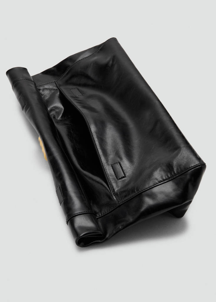Leather clutch bag with metallic appliqué — Black