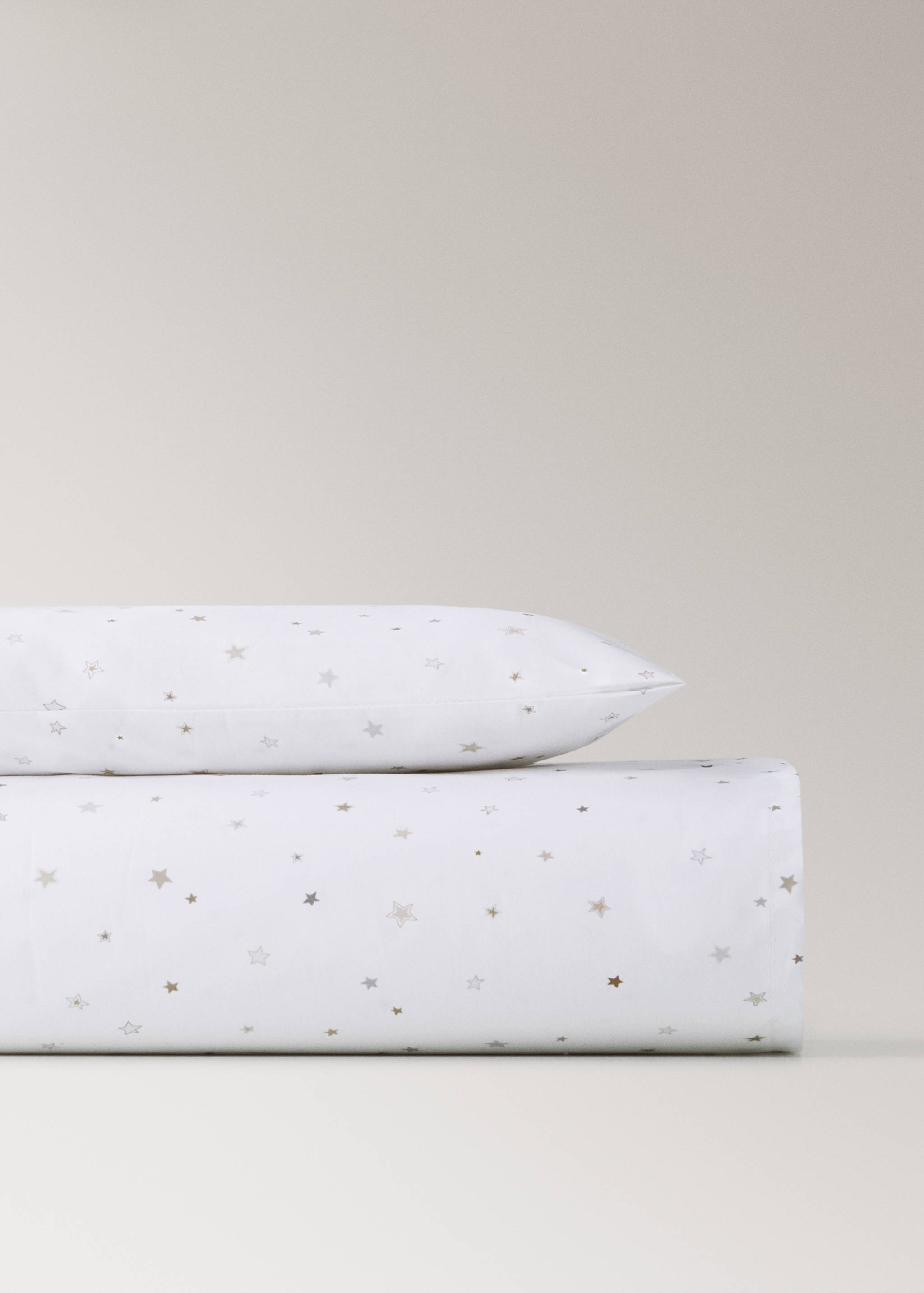 Reversible star print cotton mini cot bumper and pillow set - Article without model