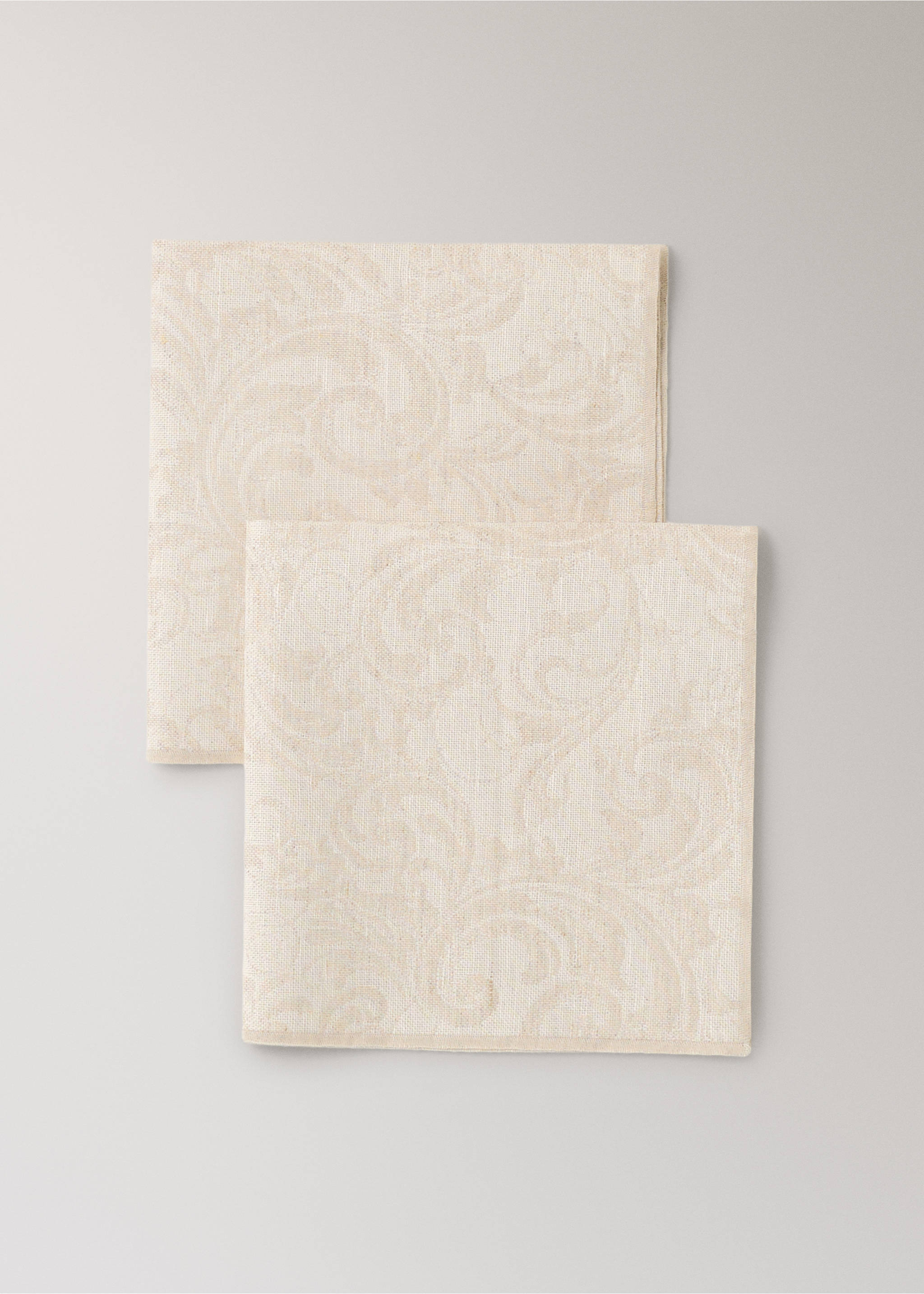 Resin-coated cotton jacquard napkins with overlock stitching - Details of the article 1, Light/Pastel Brown. Ref: 37082543-00.