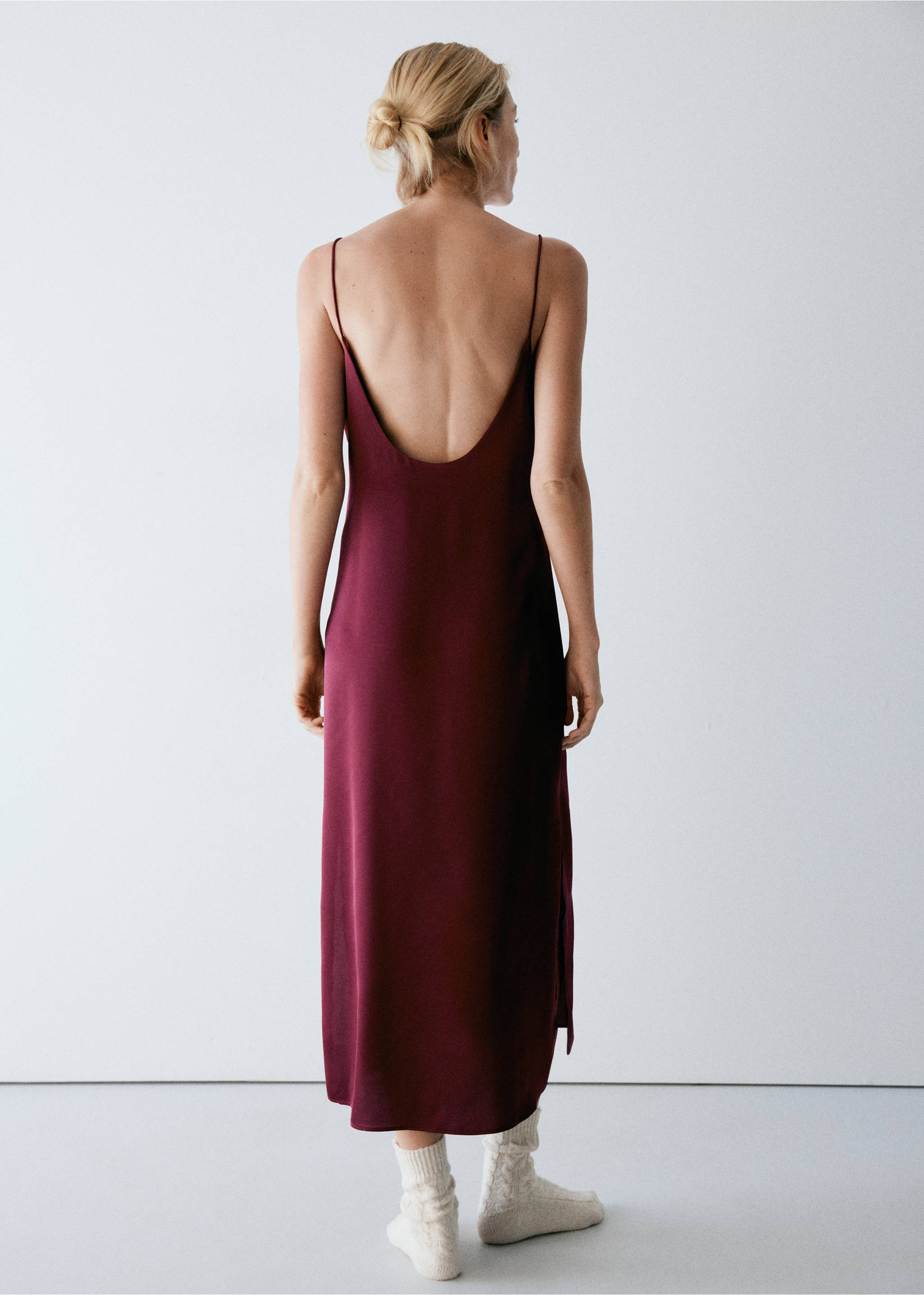 Burgundy pyjama trousers shown from the back, worn by a model., Red. Ref: 37082943-00.