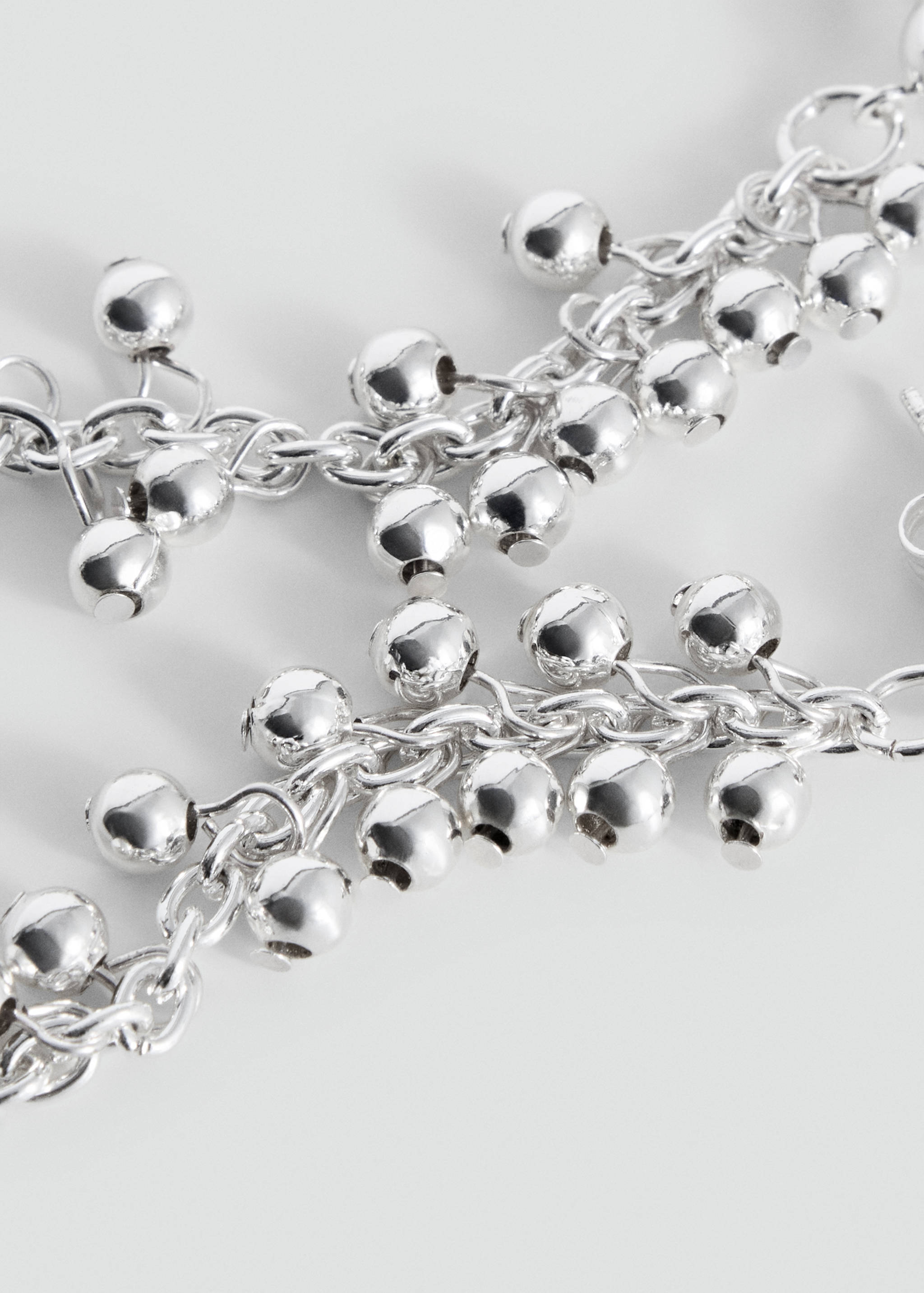 Boucles d'oreilles pendantes perles - Plan moyen