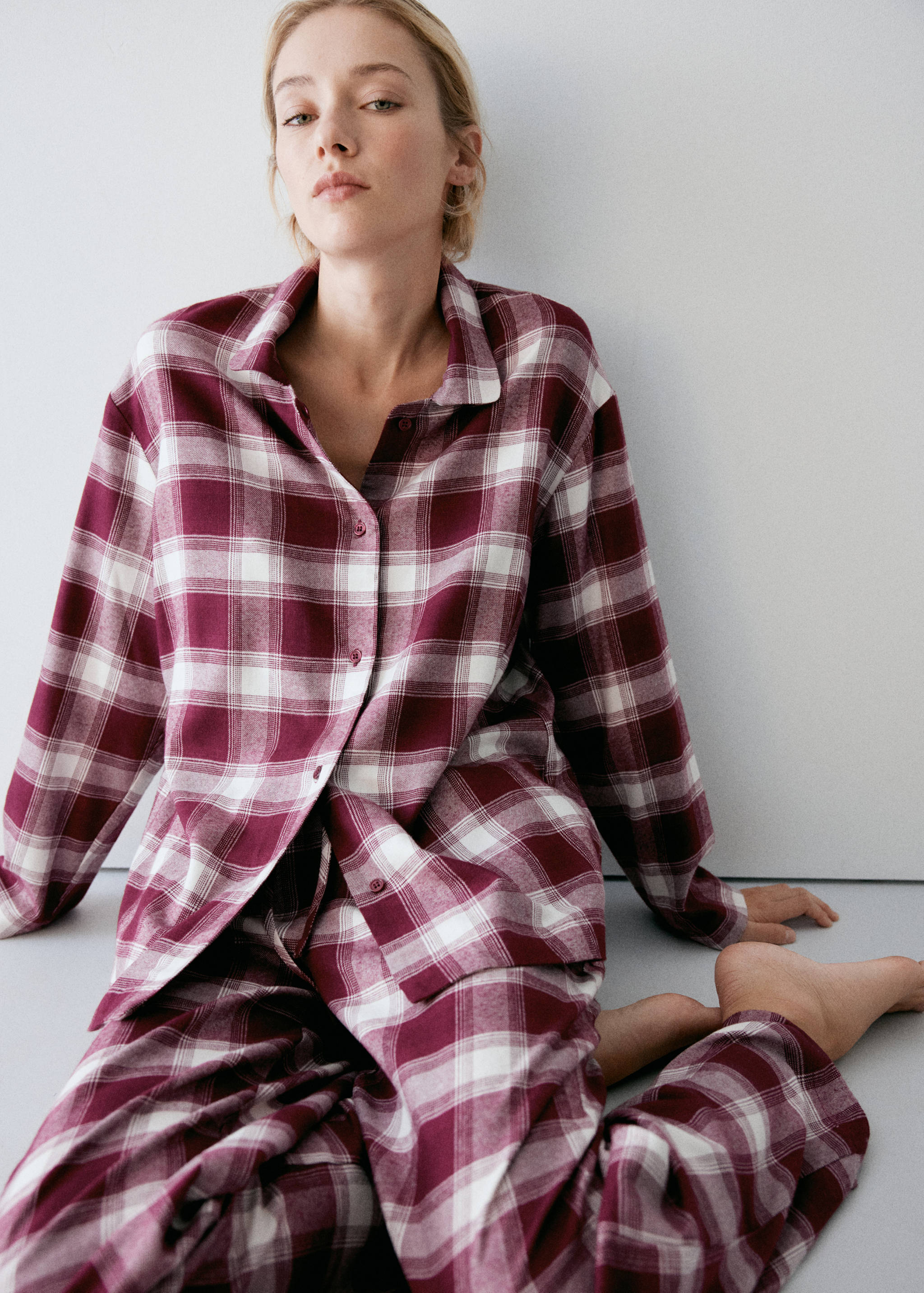 Burgundy and white plaid pyjama shirt with a classic collar and button placket.
