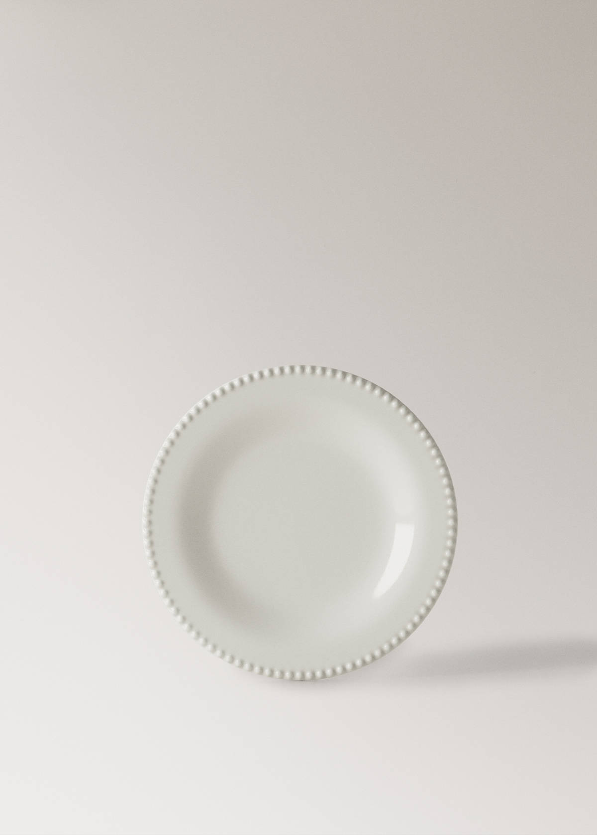 Stoneware dessert plate with decorative decorative edge — White