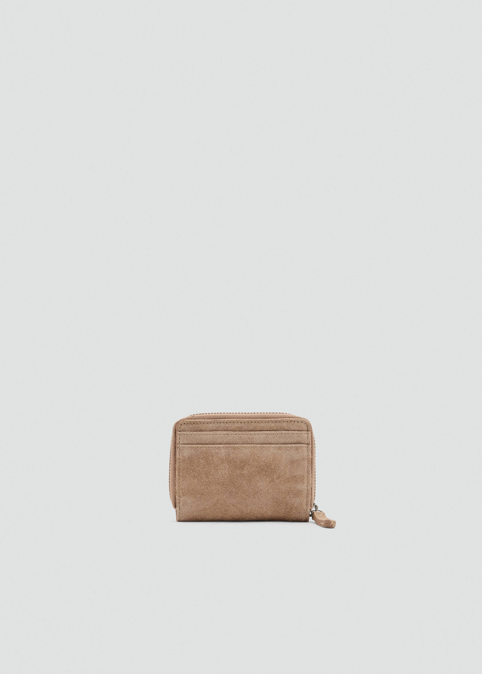 Compact brown wallet with a soft suede-like texture and zip-around fastening.