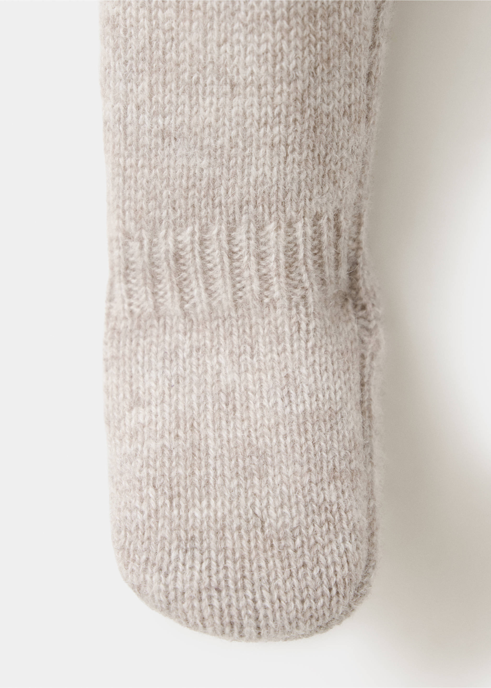 Close-up of beige knit trousers fabric texture., Sand. Ref: 37084467-00.