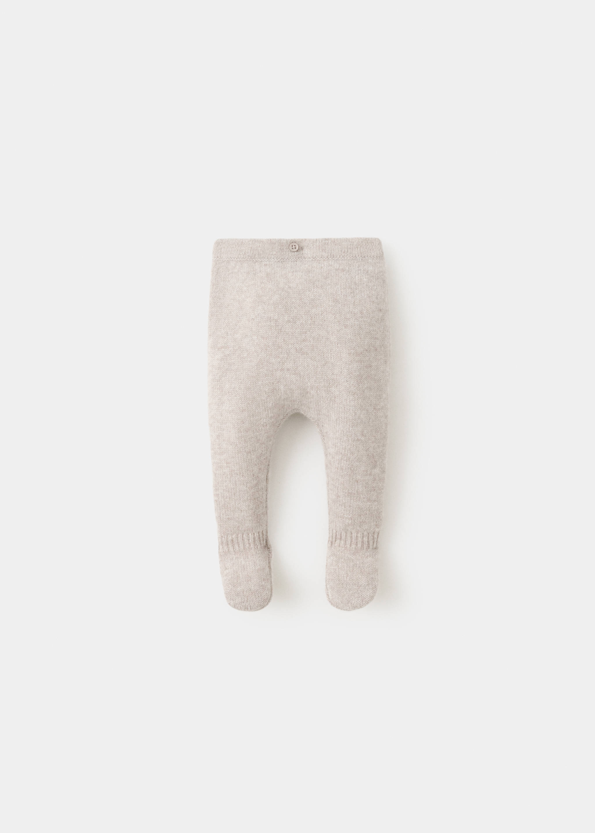 Beige knit baby trousers with integrated feet and a buttoned waistband.