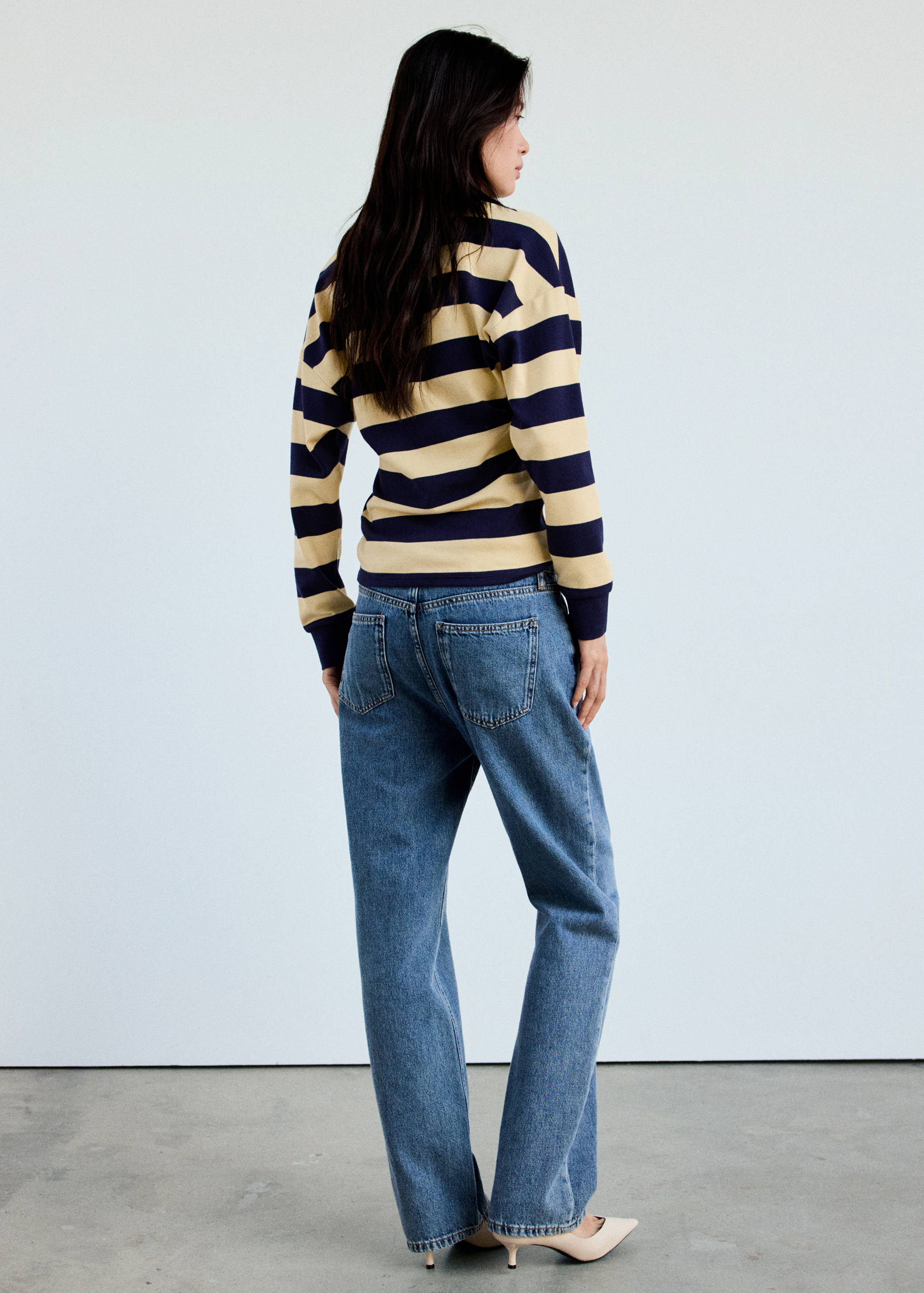 Striped polo-neck sweater - Reverse of the article