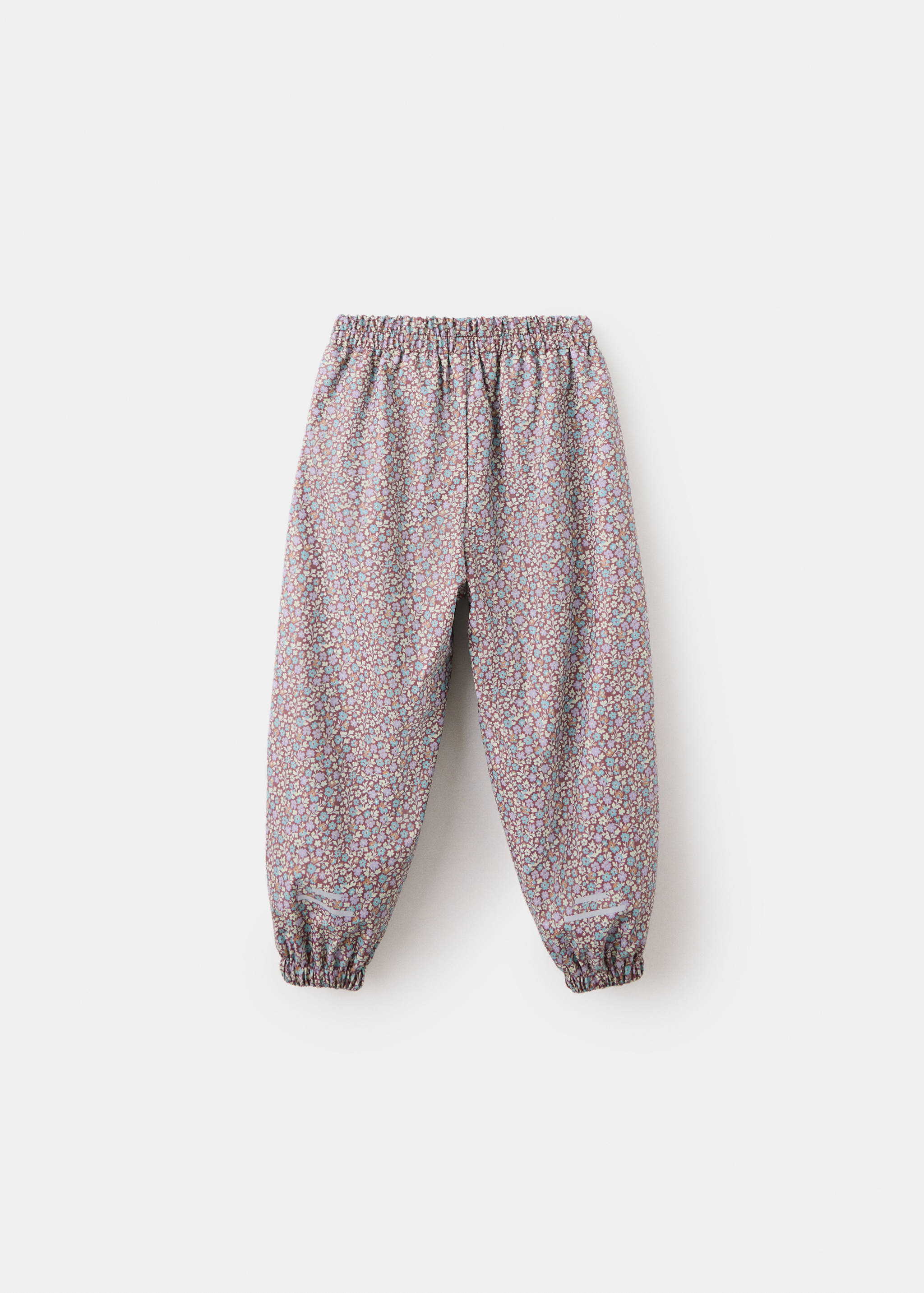 Pantalón chubasquero flores - Reverso del artículo