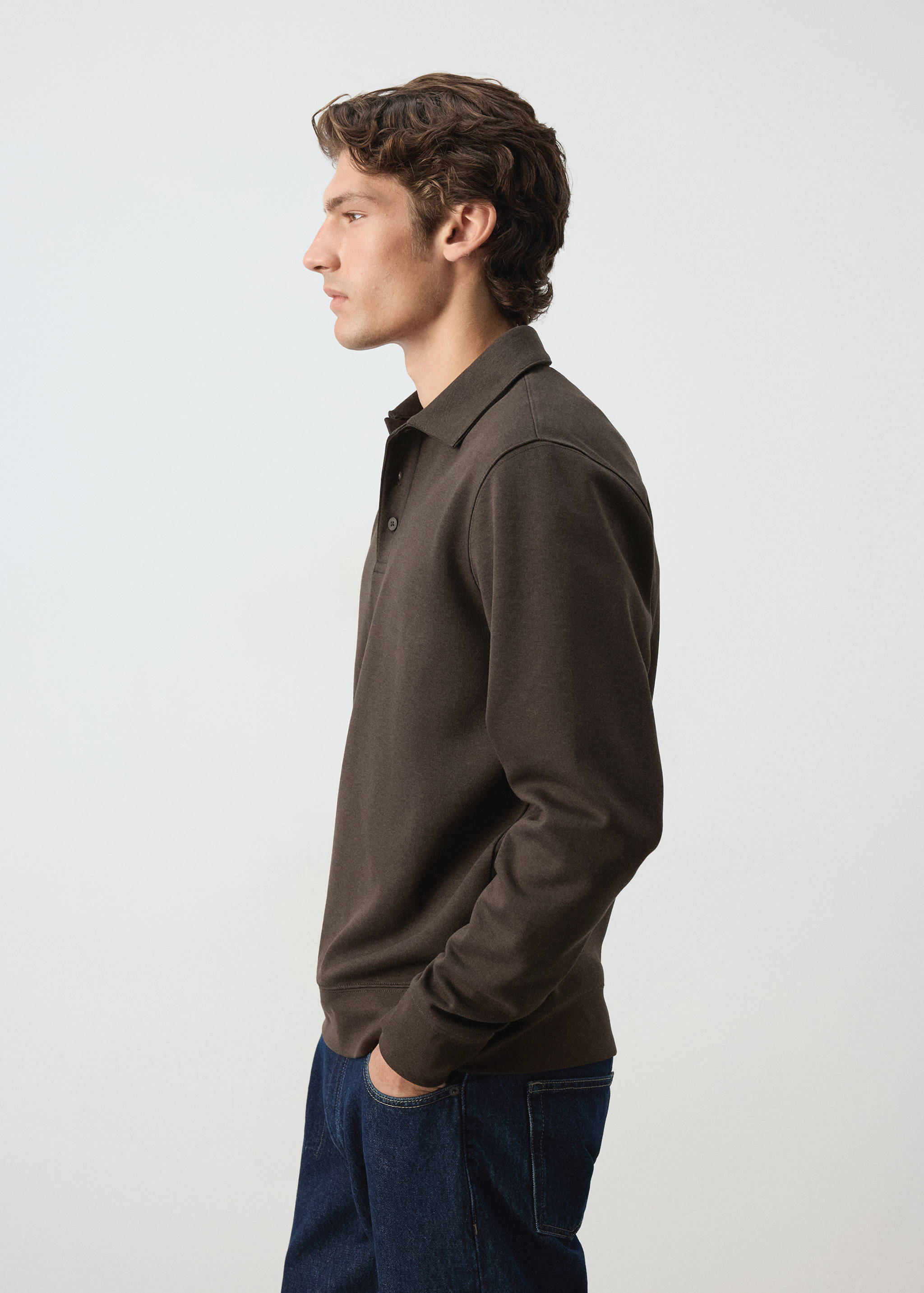 Dark brown polo sweatshirt with long sleeves and a button placket