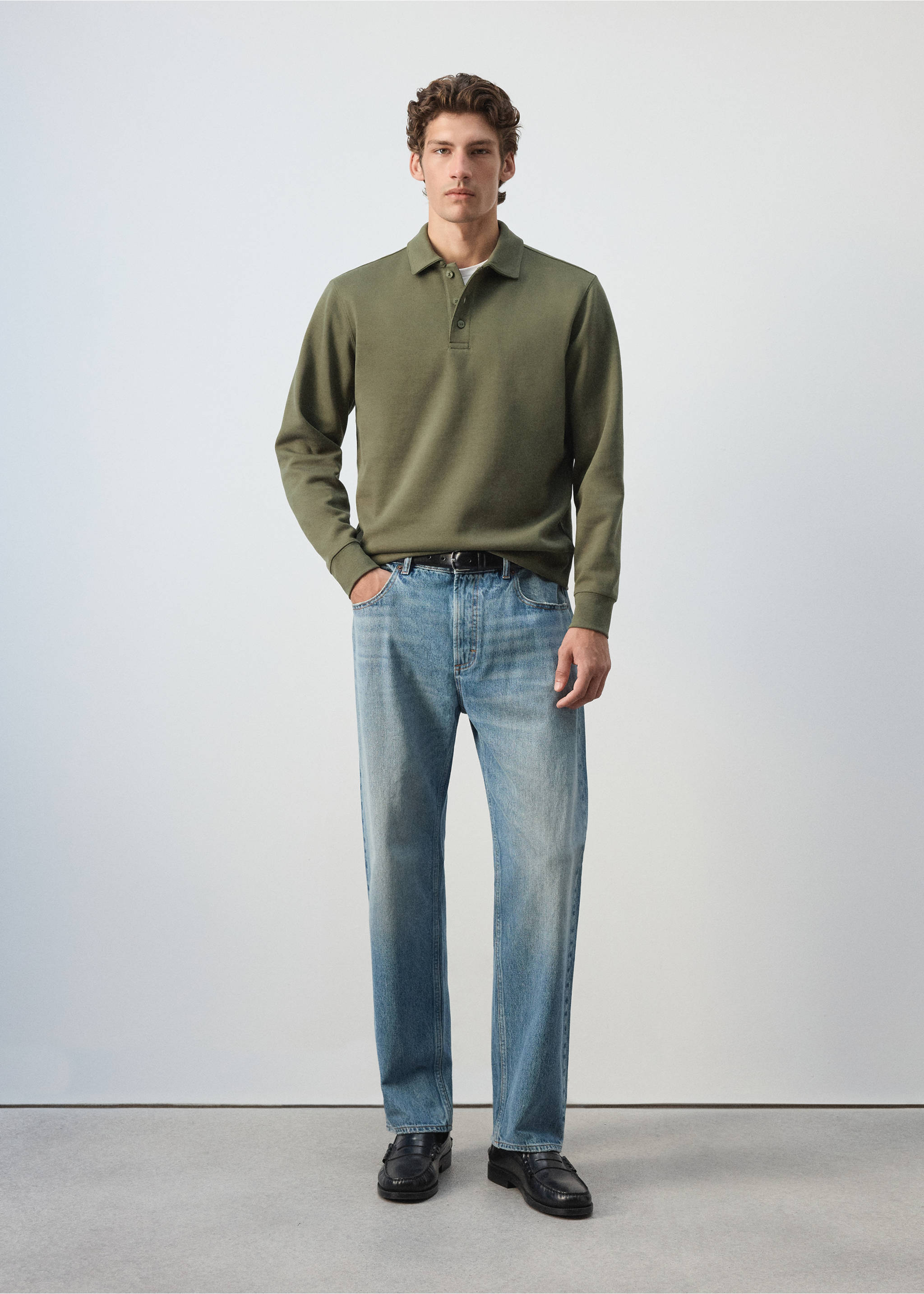 Khaki-green polo sweatshirt with long sleeves, worn with light-wash blue trousers., Khaki. Ref: 37085998-00.