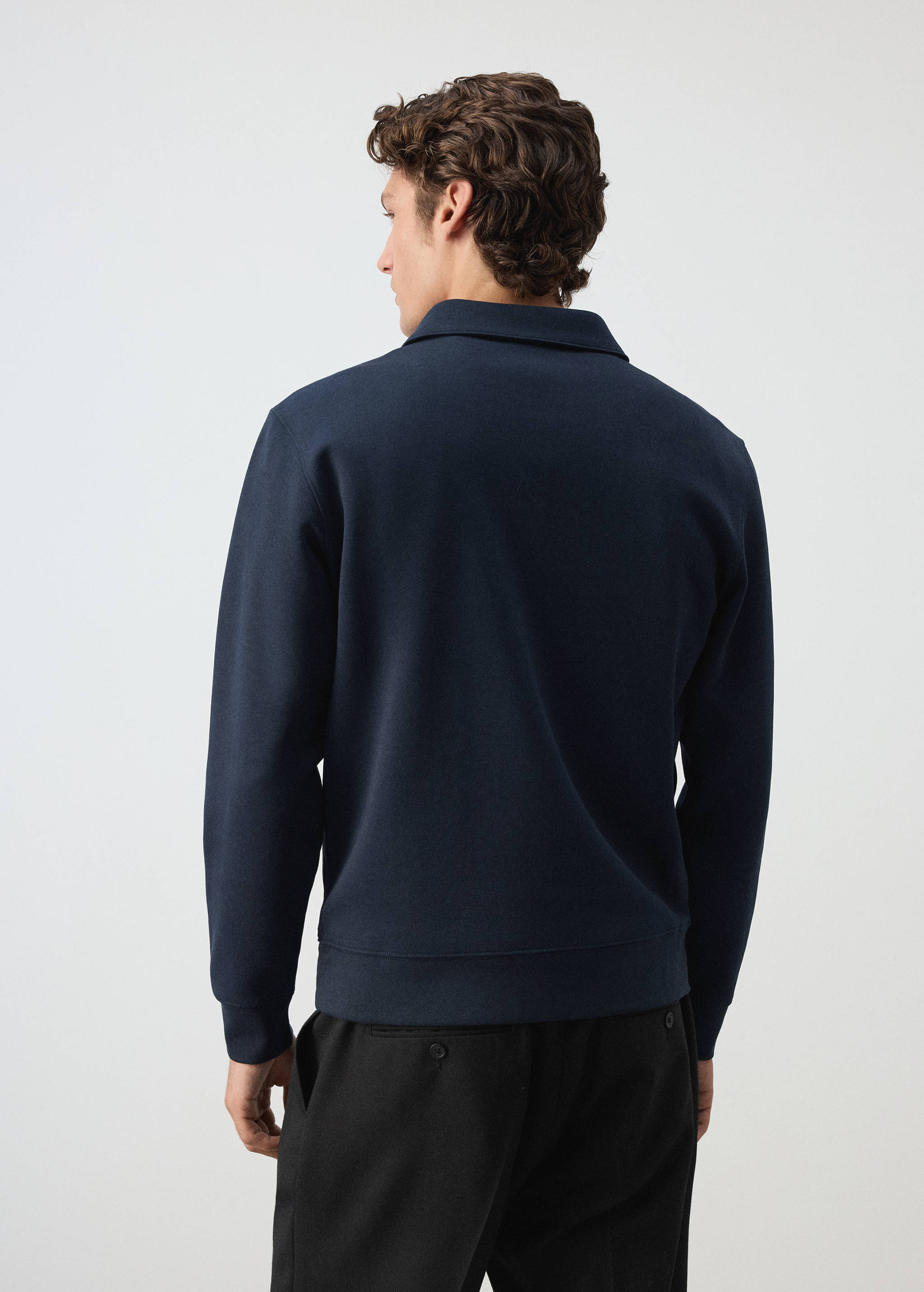 Dark navy blue sweatshirt with a collar, shown from the back.