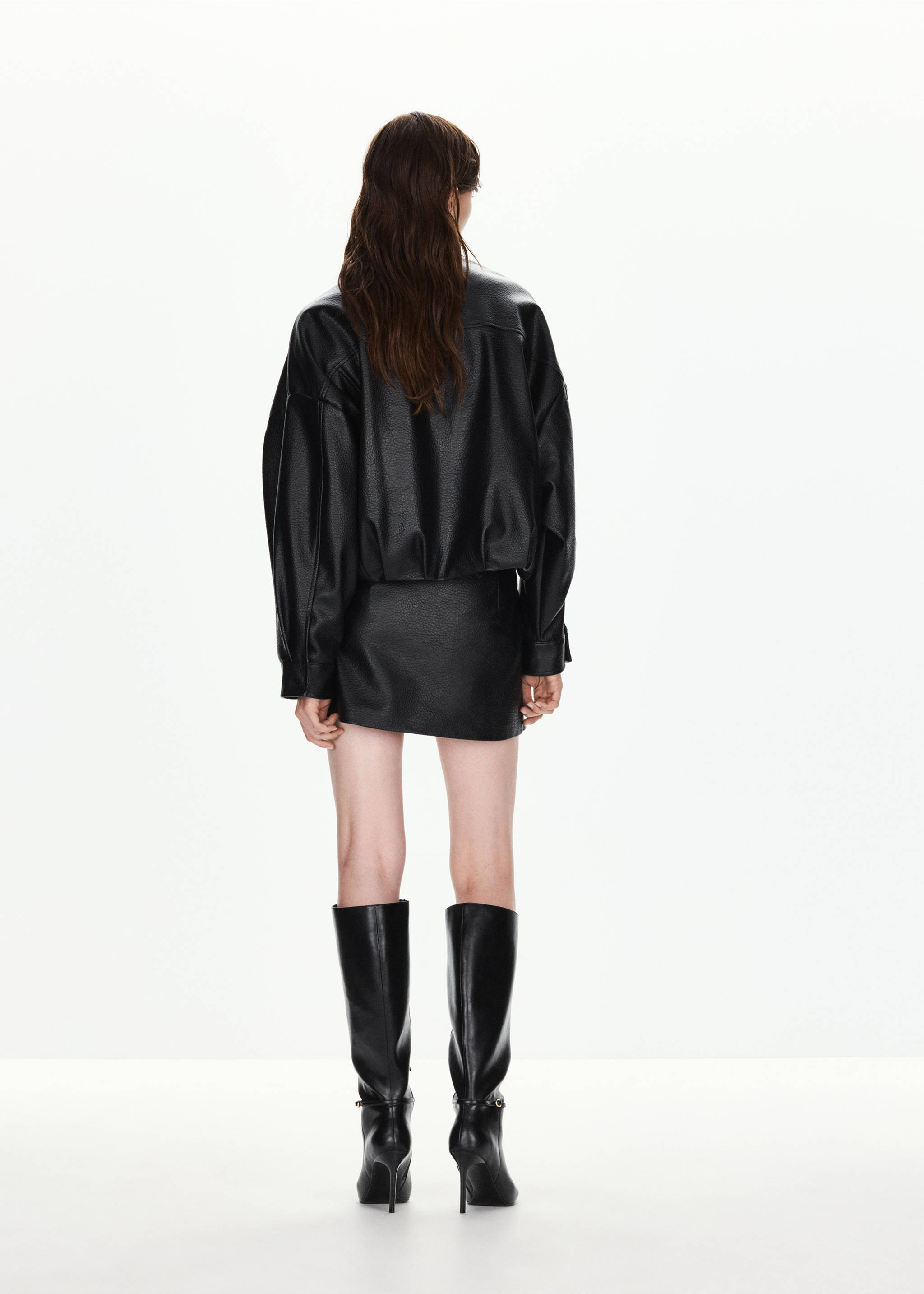 Back view of a black jacket with a relaxed silhouette and elasticated hem., Black. Ref: 37086000-01.