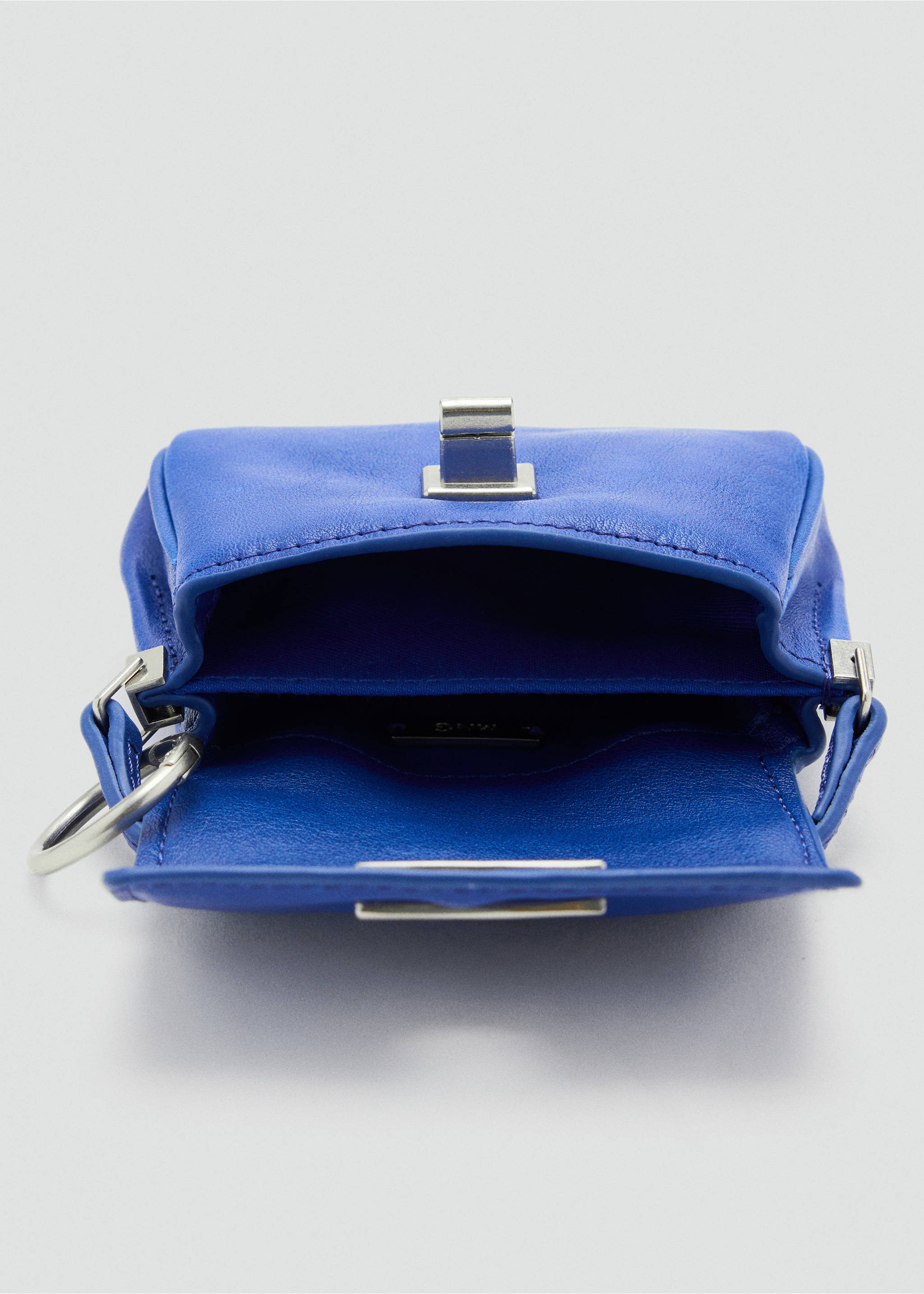 Blue keyring pouch with silver-toned metal hardware, close-up view., Vibrant blue. Ref: 37086012-00.
