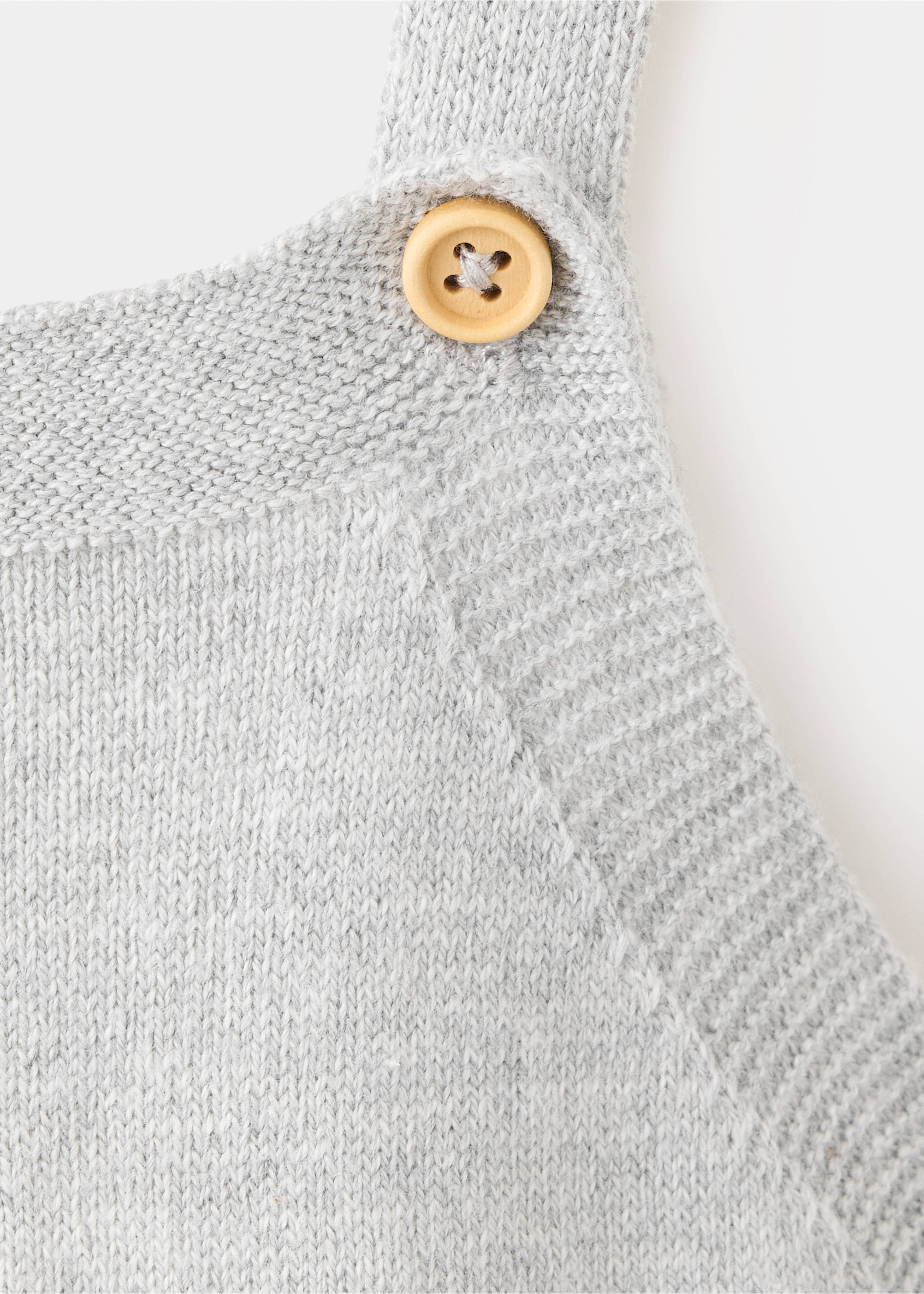Long knit dungarees with pockets - Details of the article 8, Medium Heather Grey. Ref: 37086321-00.
