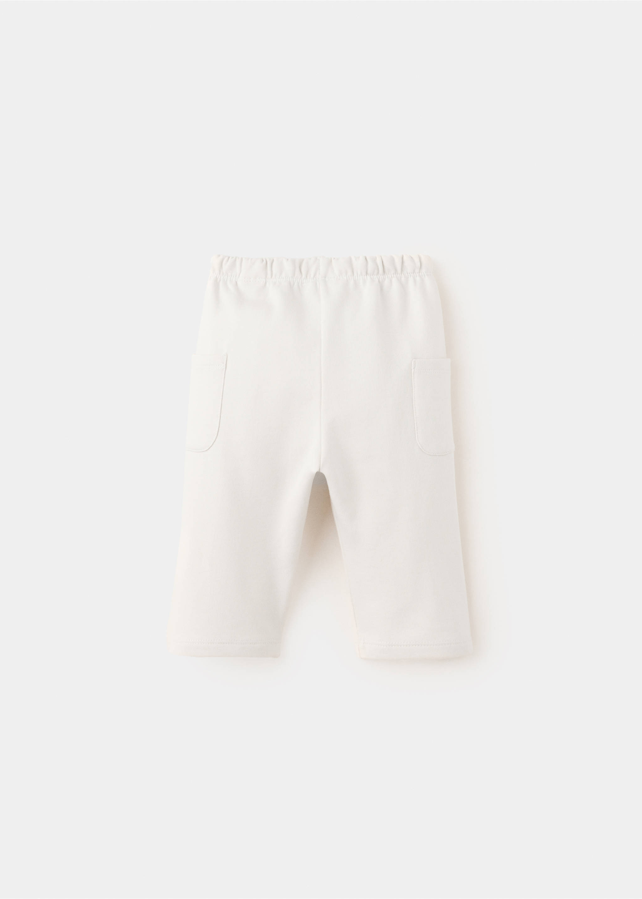 Joggers with embroidered detail pockets - Reverse of the article, Ecru. Ref: 37086339-00.