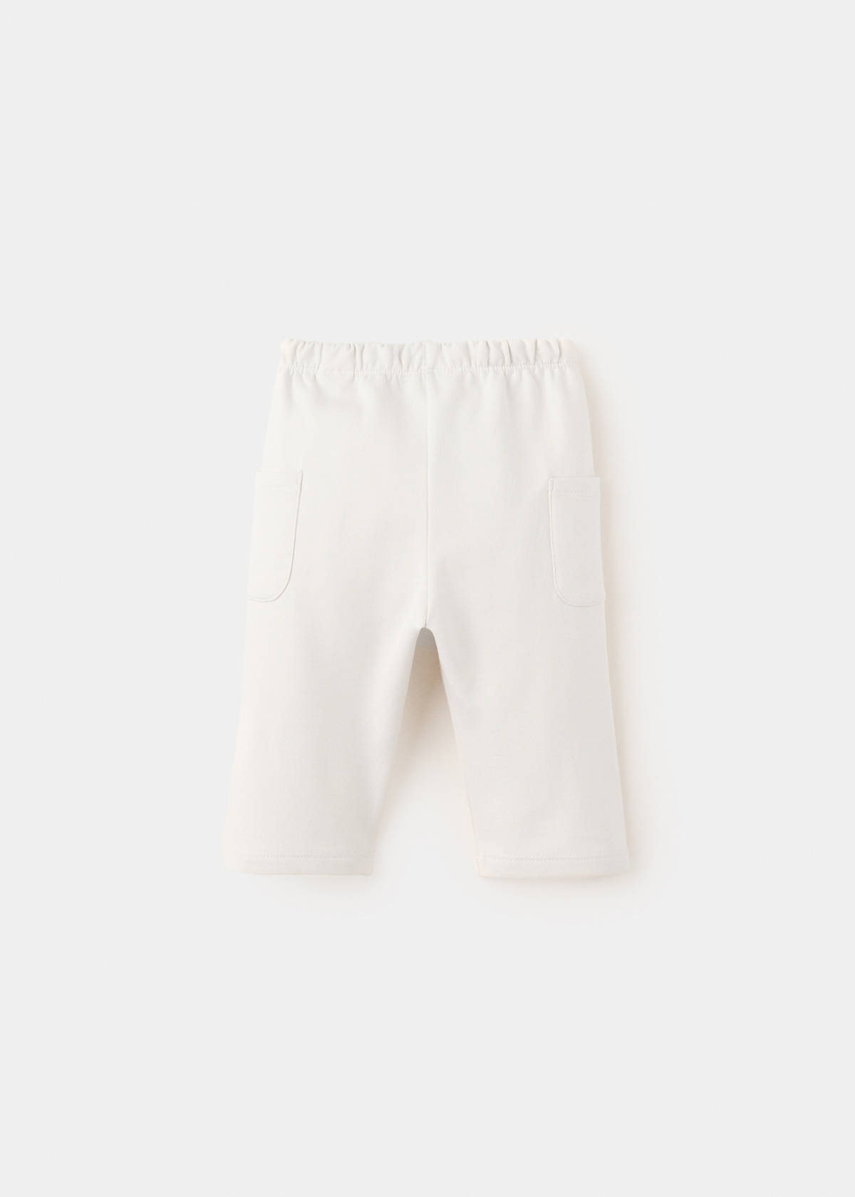 Joggers with embroidered detail pockets — Ecru