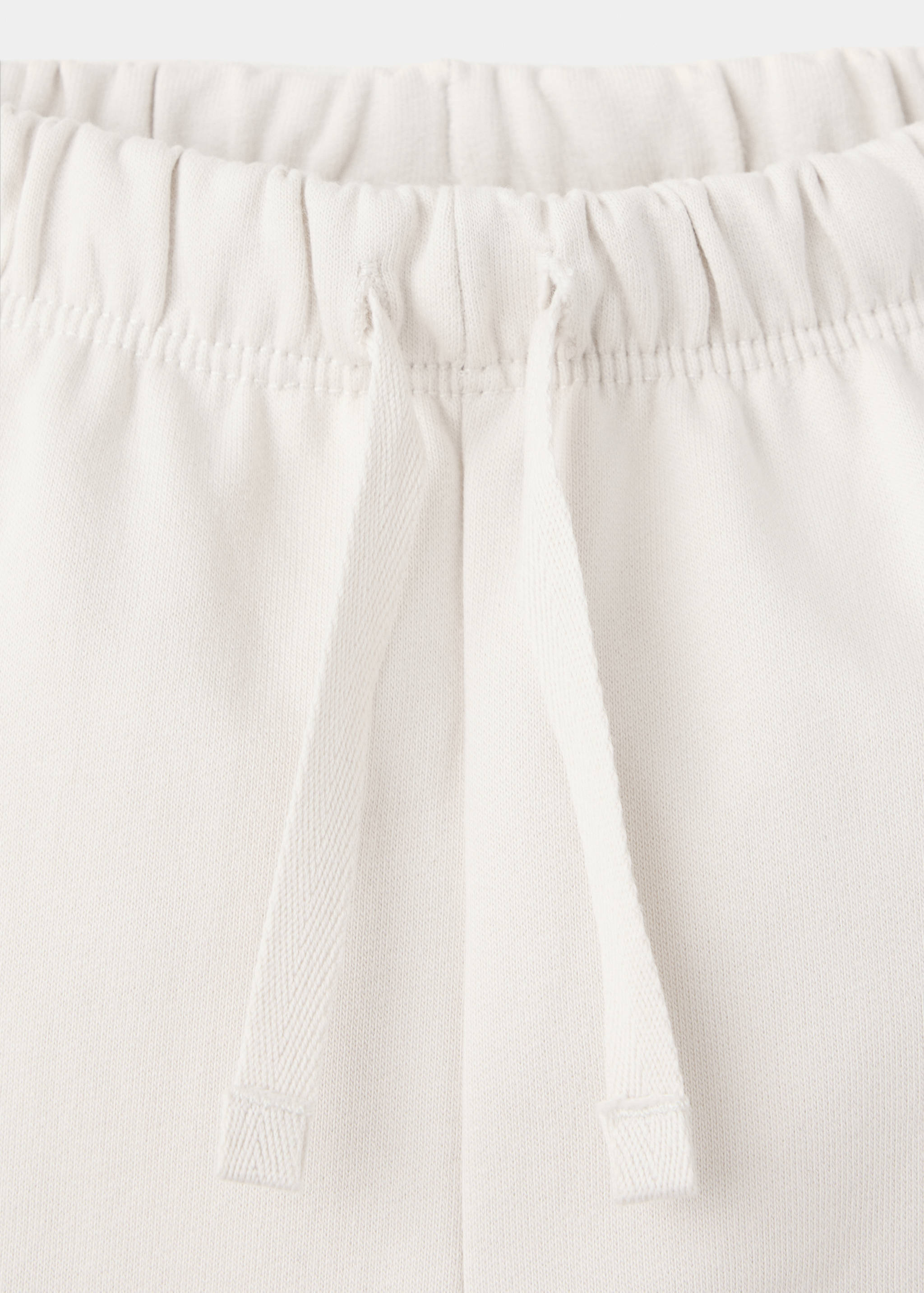 Joggers with embroidered detail pockets - Details of the article 8