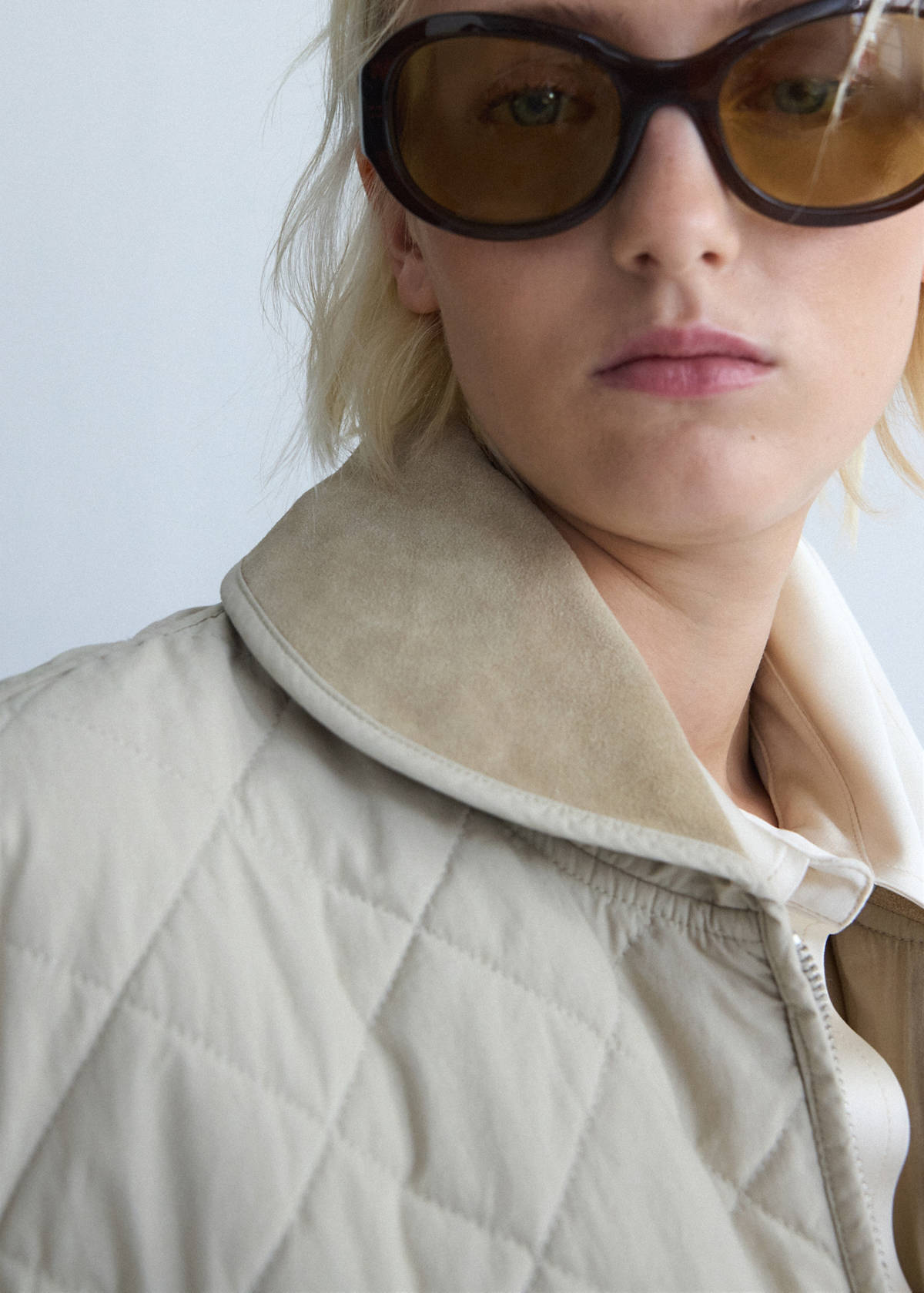 Quilted jacket with leather panels — Beige