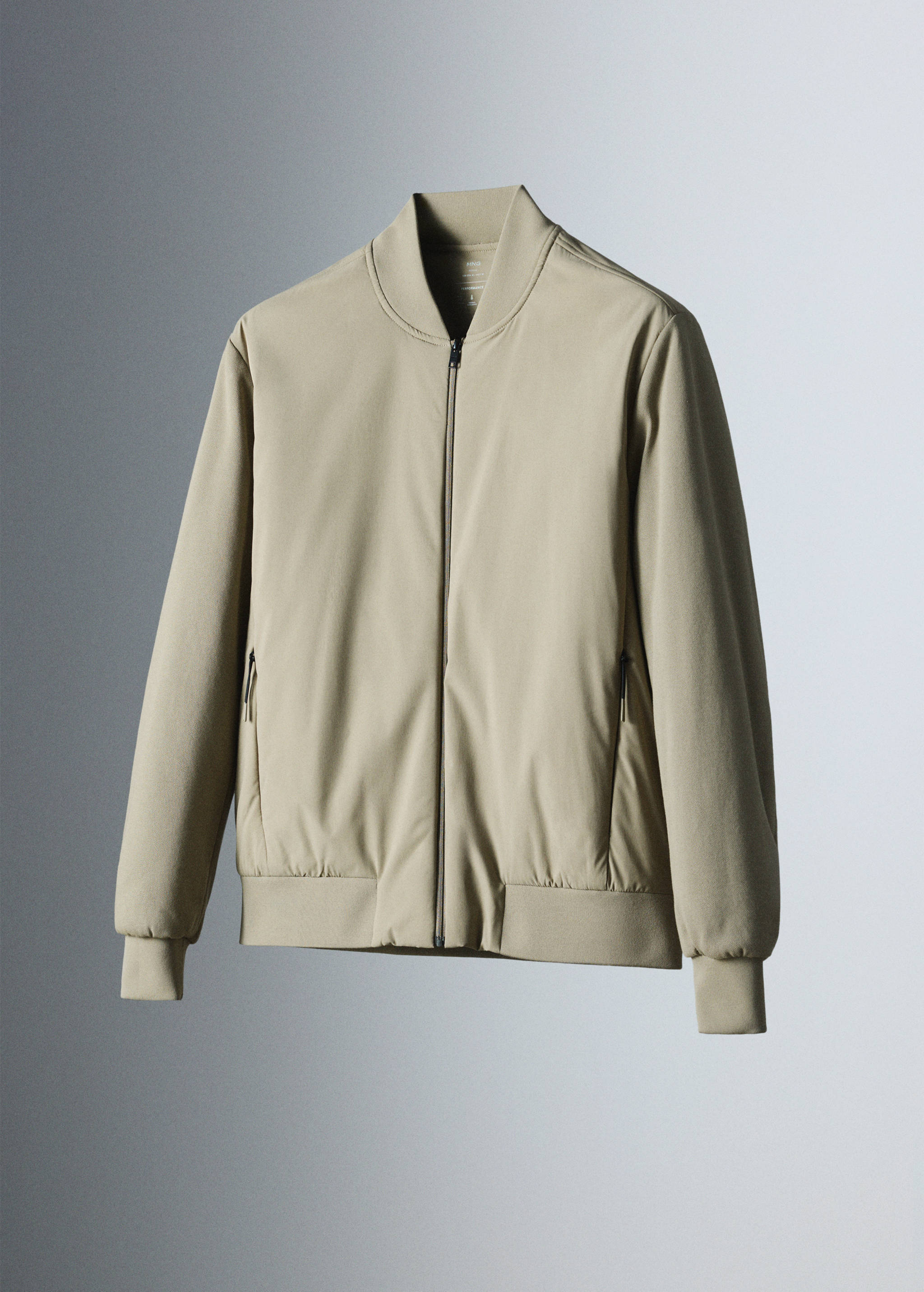 Light beige zip-up sweatshirt with a ribbed collar and cuffs.