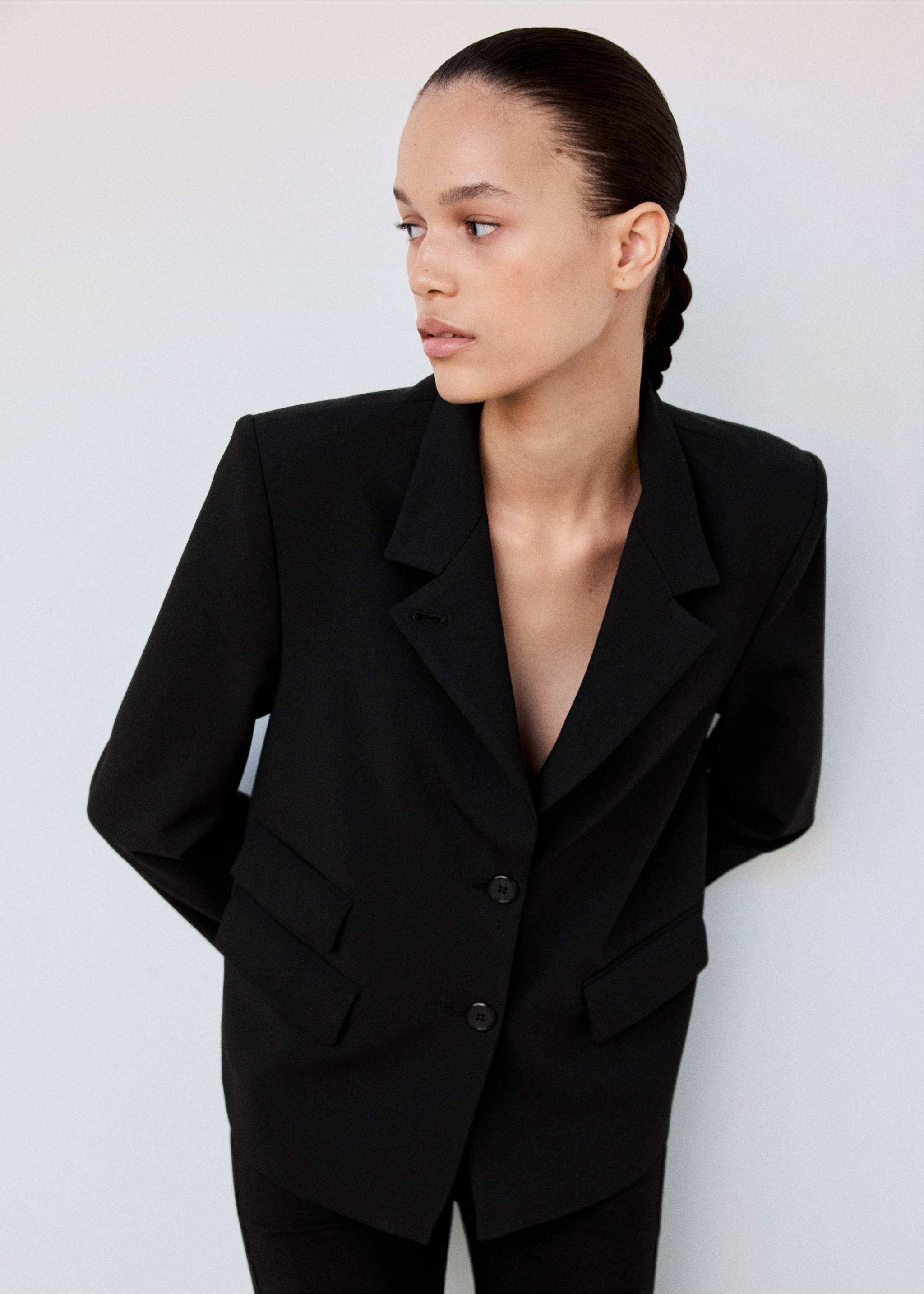 Black structured blazer with notched lapels and front button fastening., Black. Ref: 37086733-00.