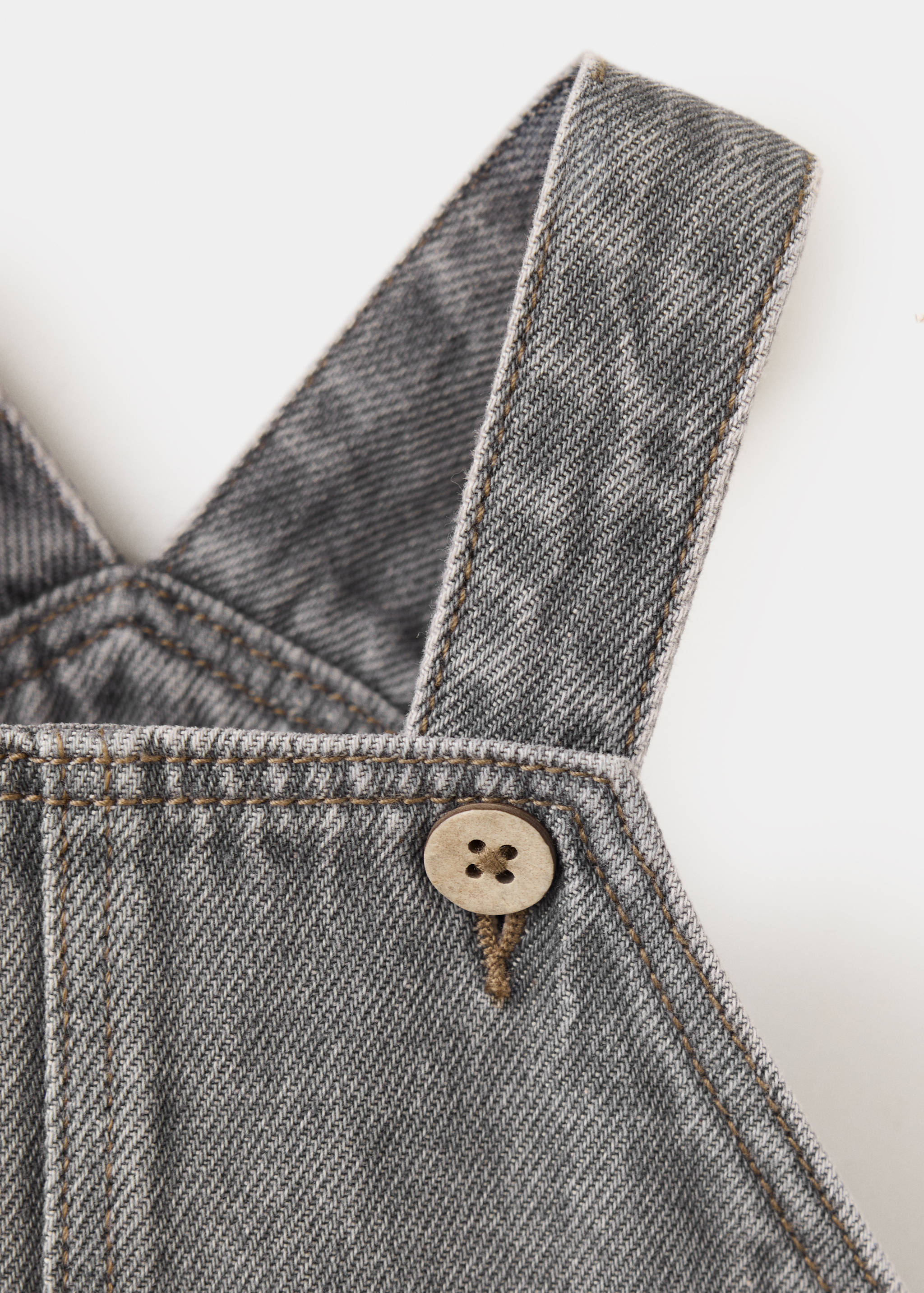 Salopette en jean boutons - Détail de l'article 8