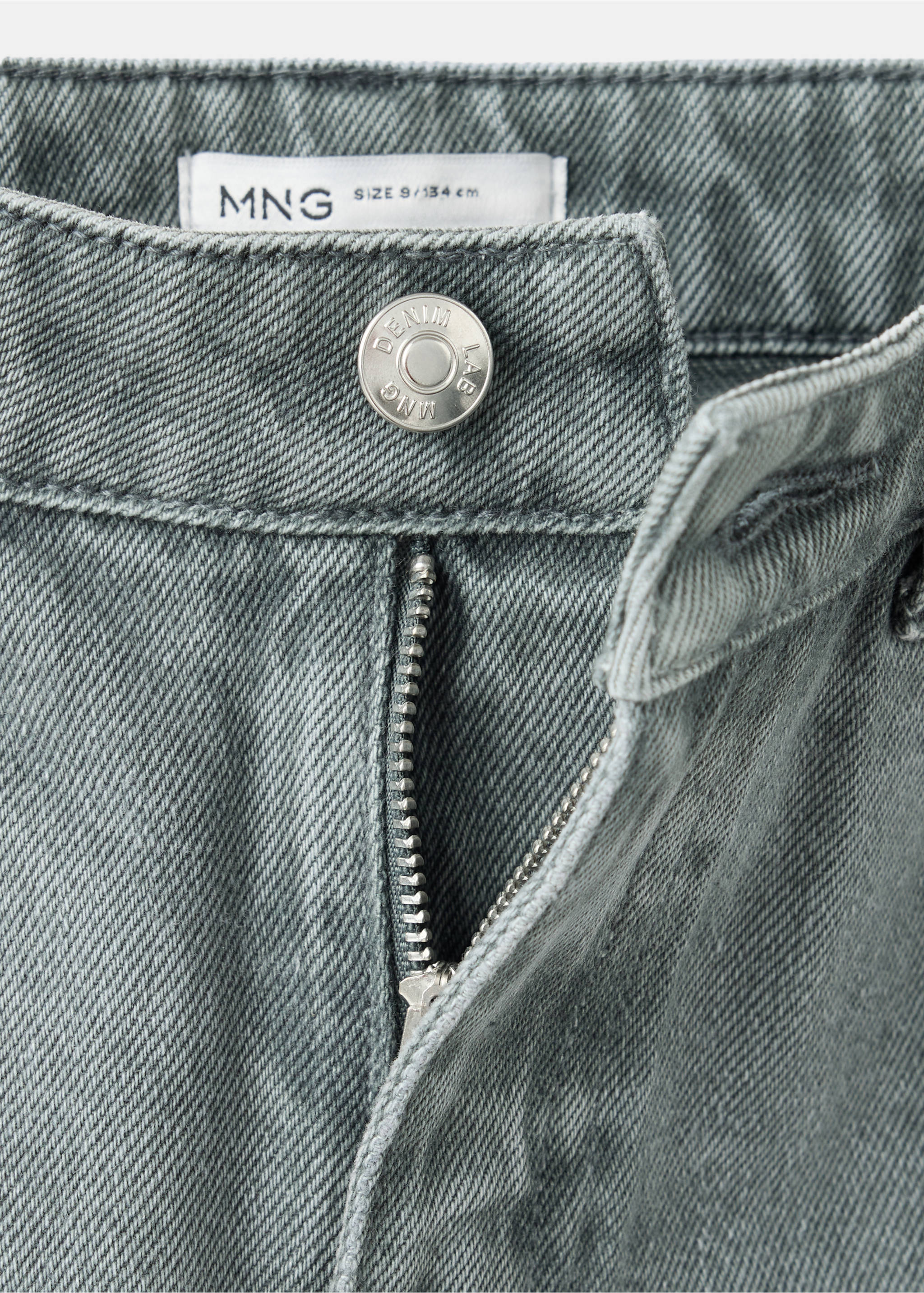 Close-up of the waistband and zip fly of grey denim trousers with embossed button., Khaki. Ref: 37087128-00.
