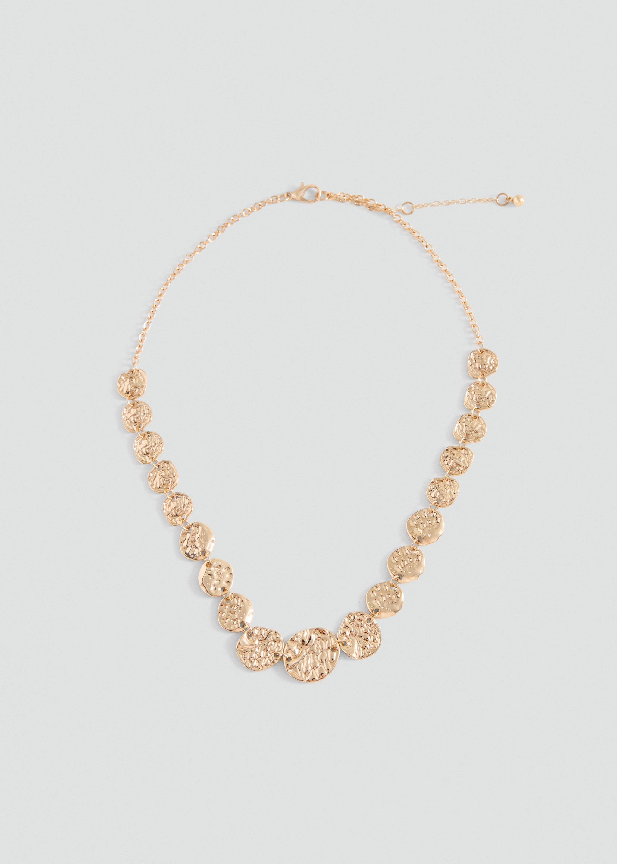Gold-toned metal collar necklace with textured disc pendants.