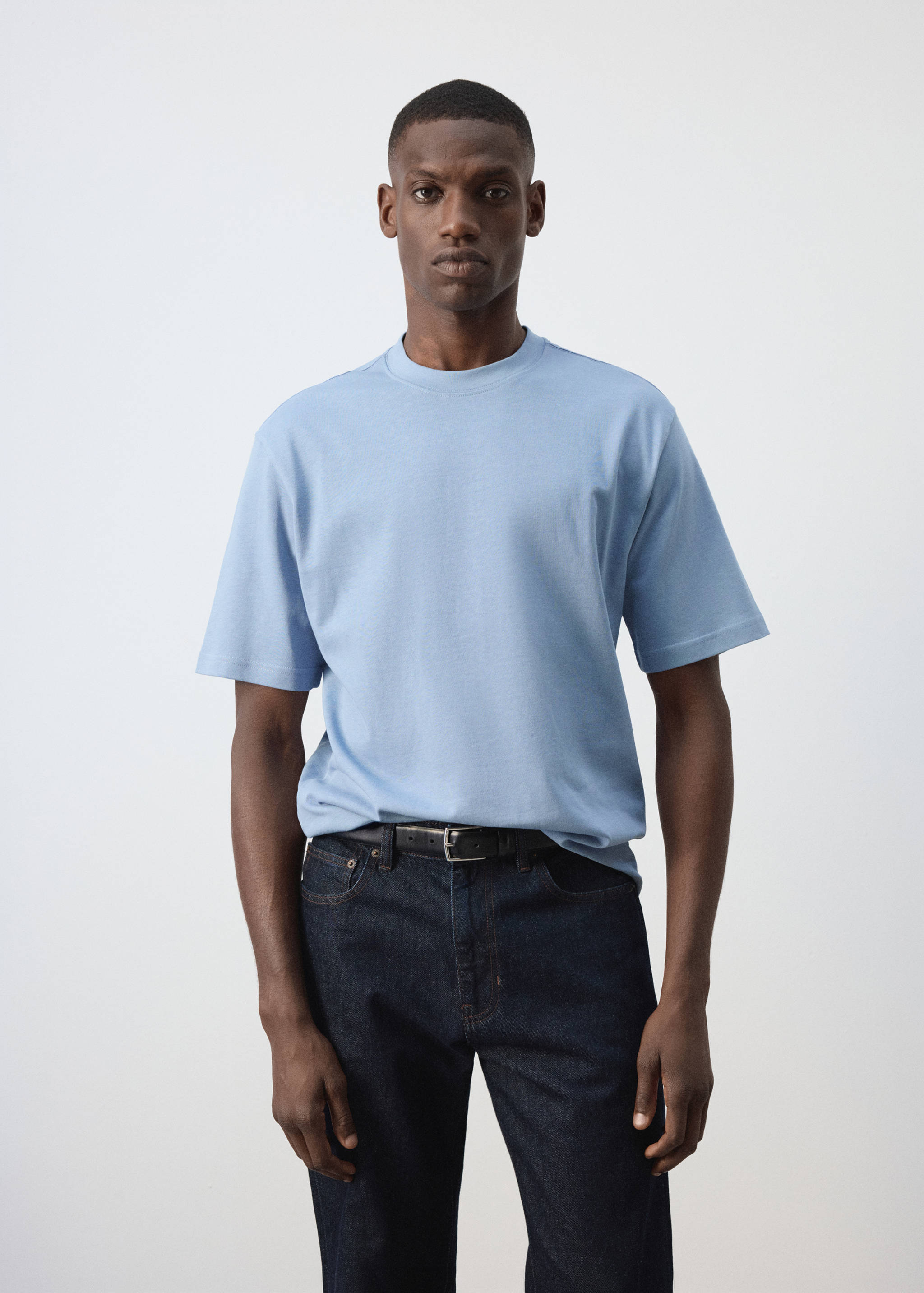 Light blue short-sleeved t-shirt with a crew neck and relaxed fit.