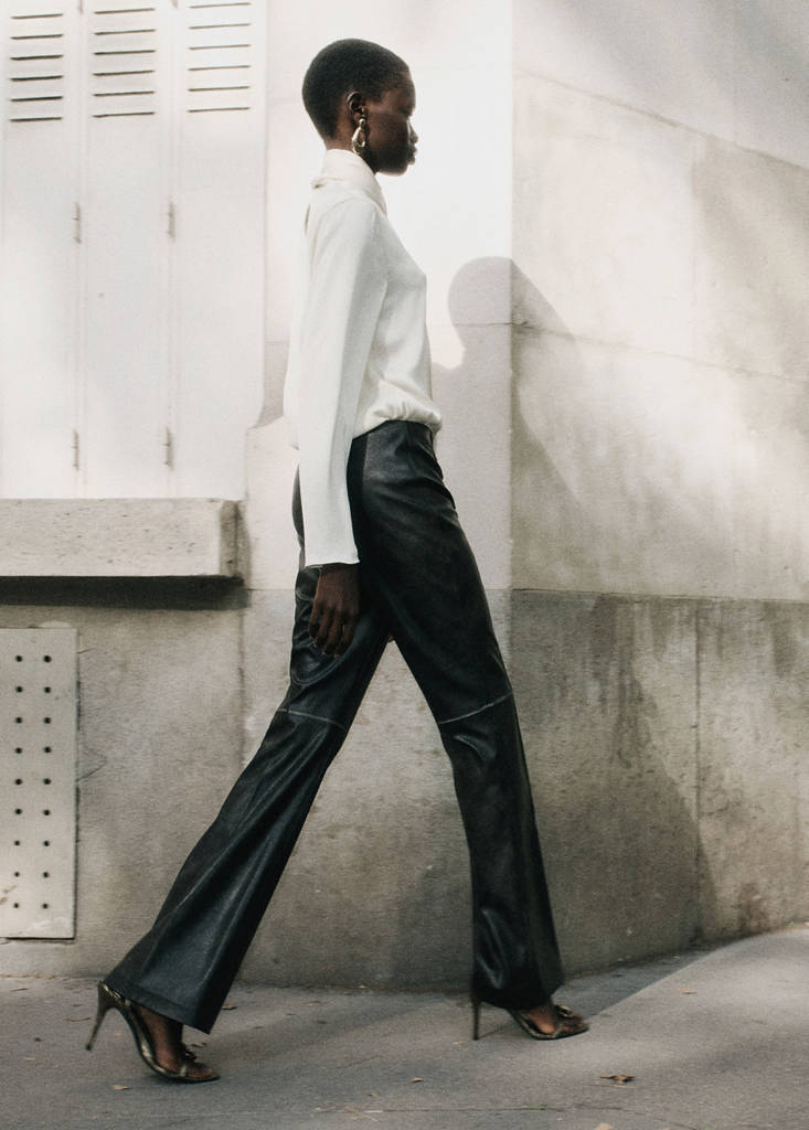 Faux-leather flared trousers by Mango