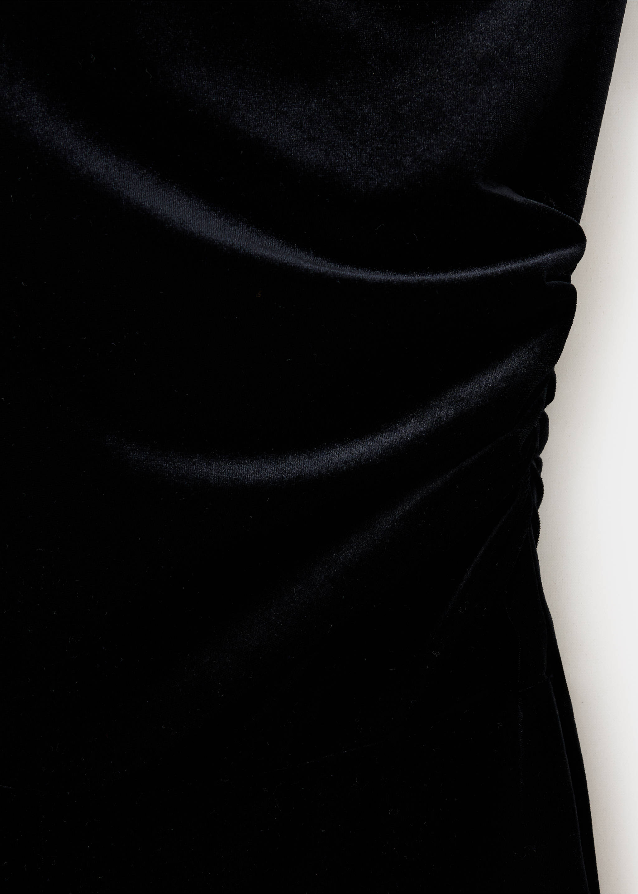 Close-up of black velvet fabric texture on a jumpsuit., Black. Ref: 37087791-00.