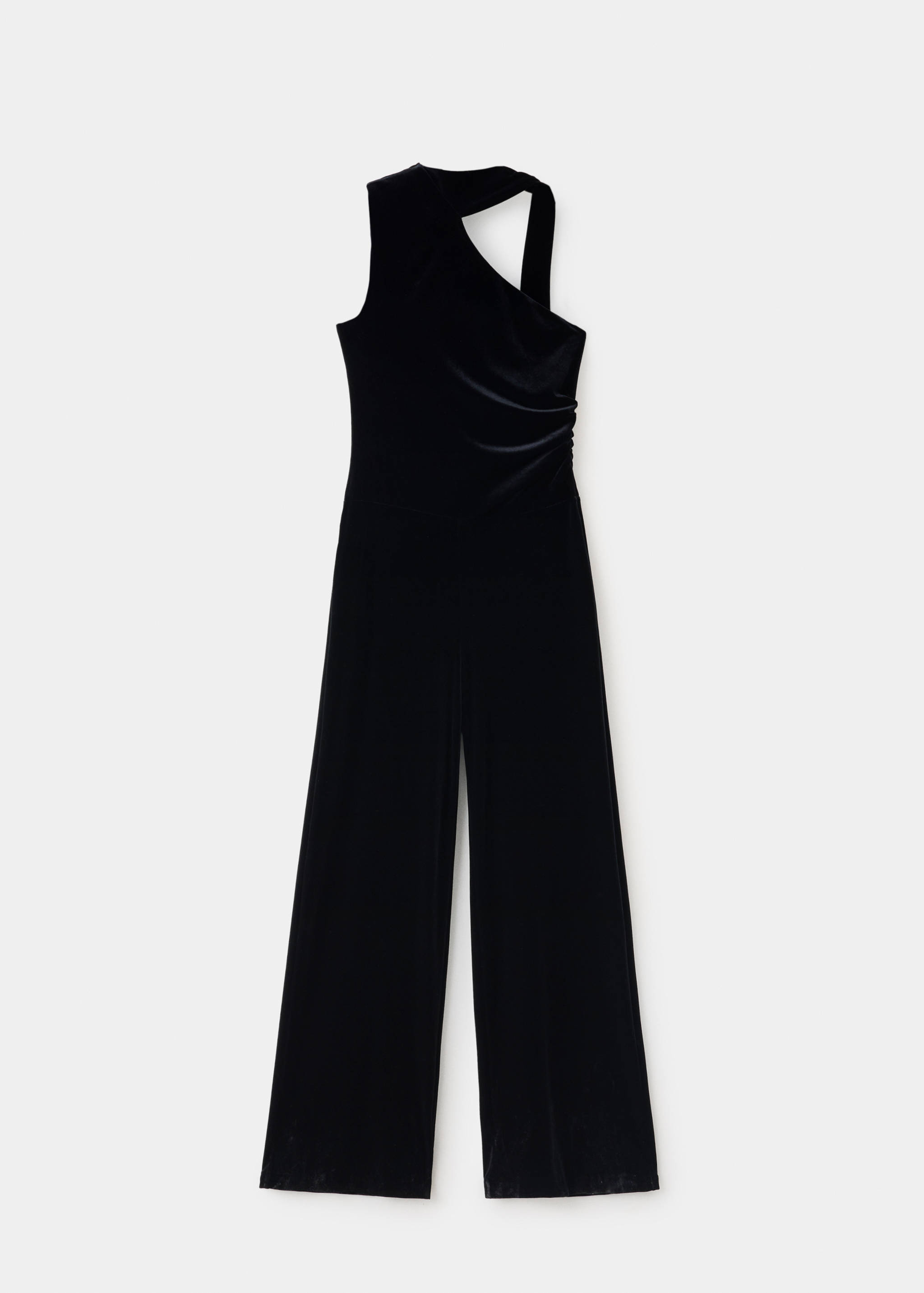 Black velvet jumpsuit with asymmetric neckline and wide legs.
