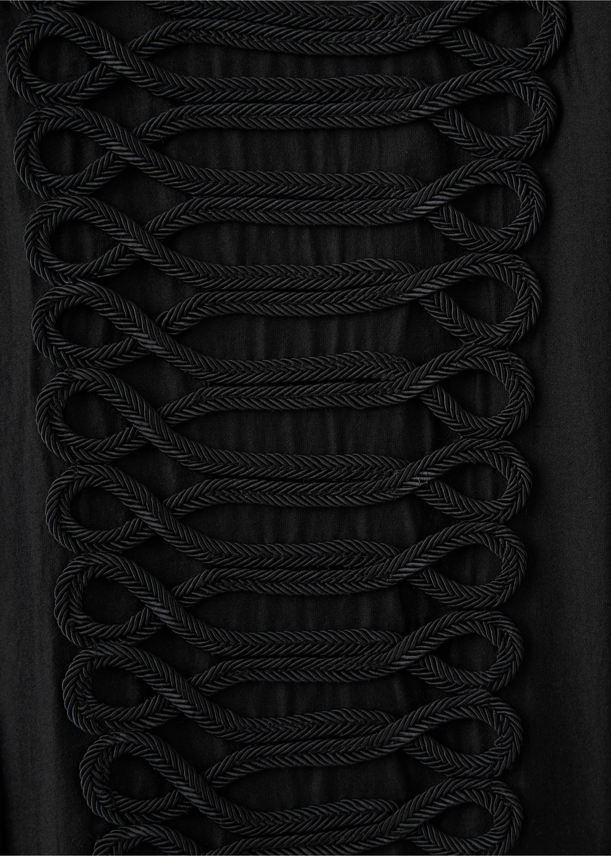 Close-up of a black shirt featuring braided cord embroidery., Black. Ref: 37087802-00.