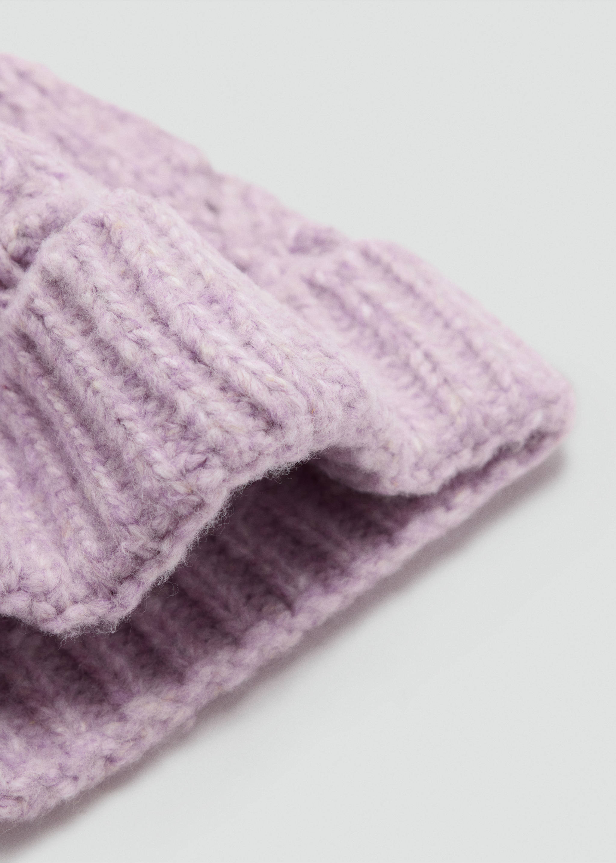 Lilac knit beanie with a textured ribbed brim in a close-up view., Lilac. Ref: 37087806-00.