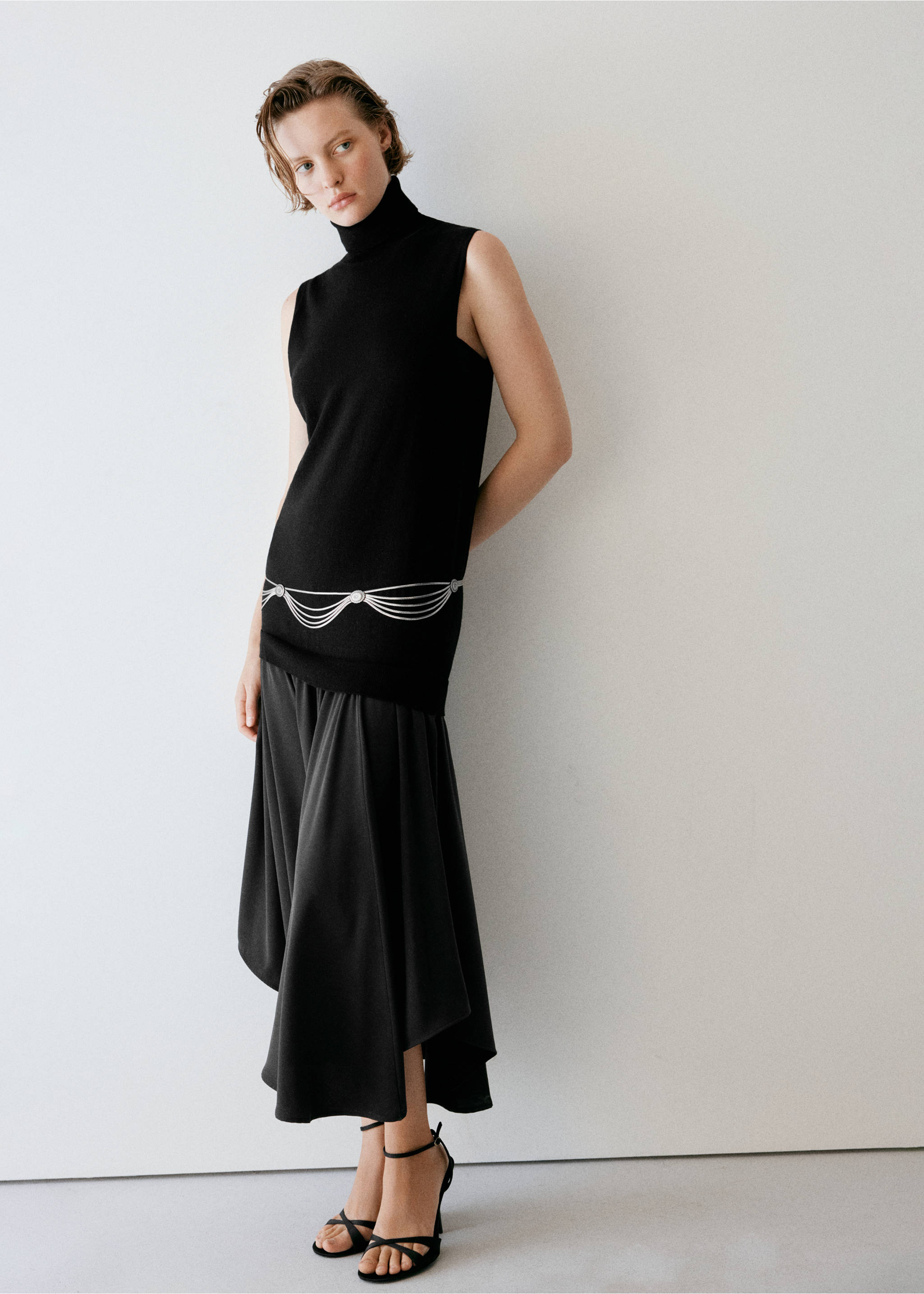 Black sleeveless roll-neck midi dress with a silver chain belt., Black. Ref: 37087811-00.
