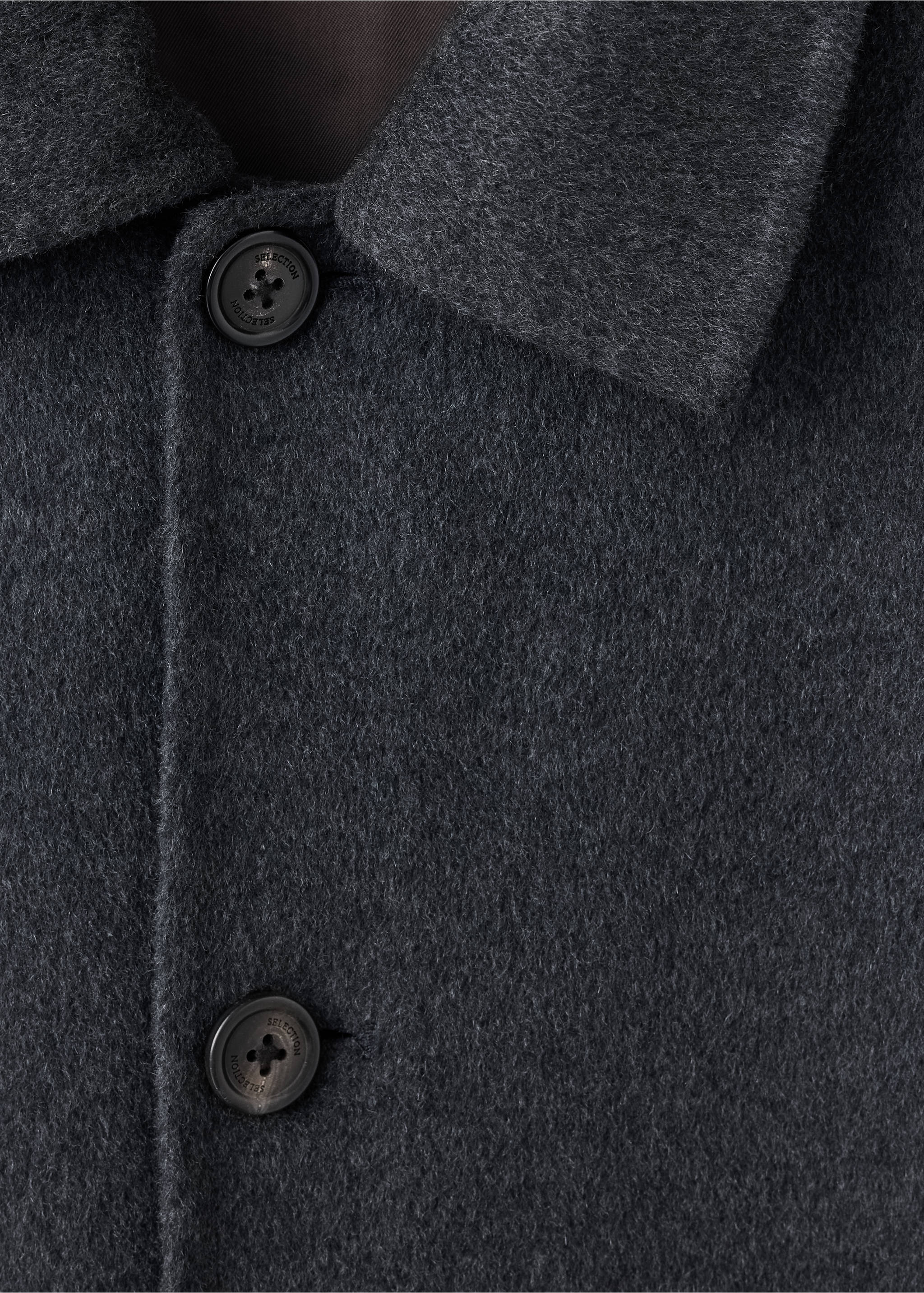 Close-up of a dark grey wool-blend coat collar and buttons., Charcoal. Ref: 37087897-00.