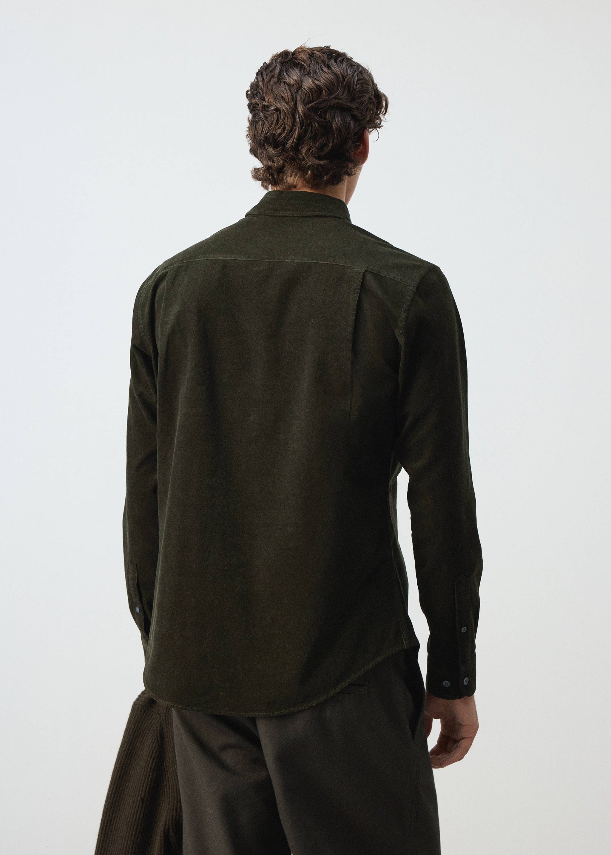 Dark green corduroy shirt, back view.