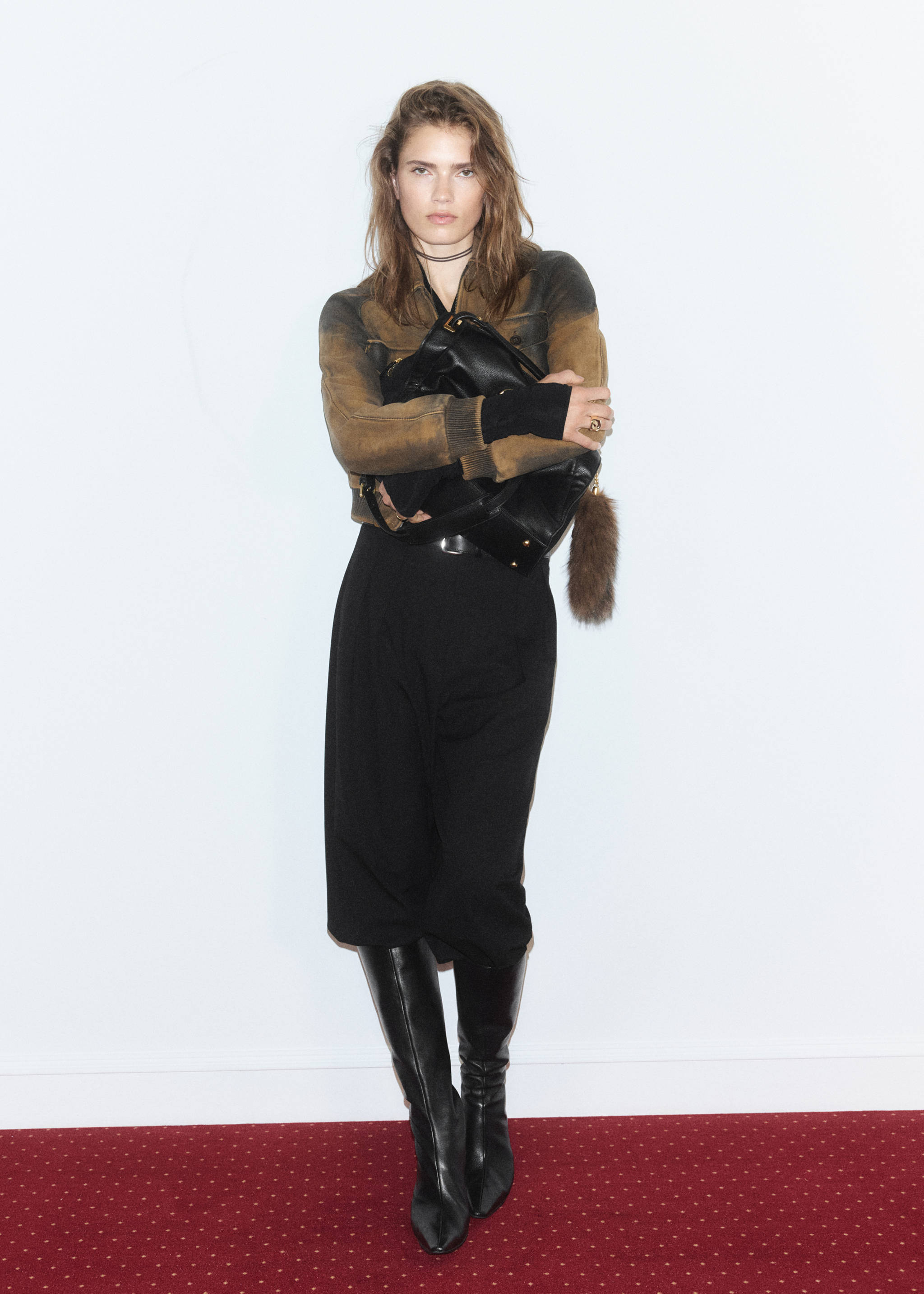 Brown weathered-finish cropped jacket with black ribbed cuffs and collar.