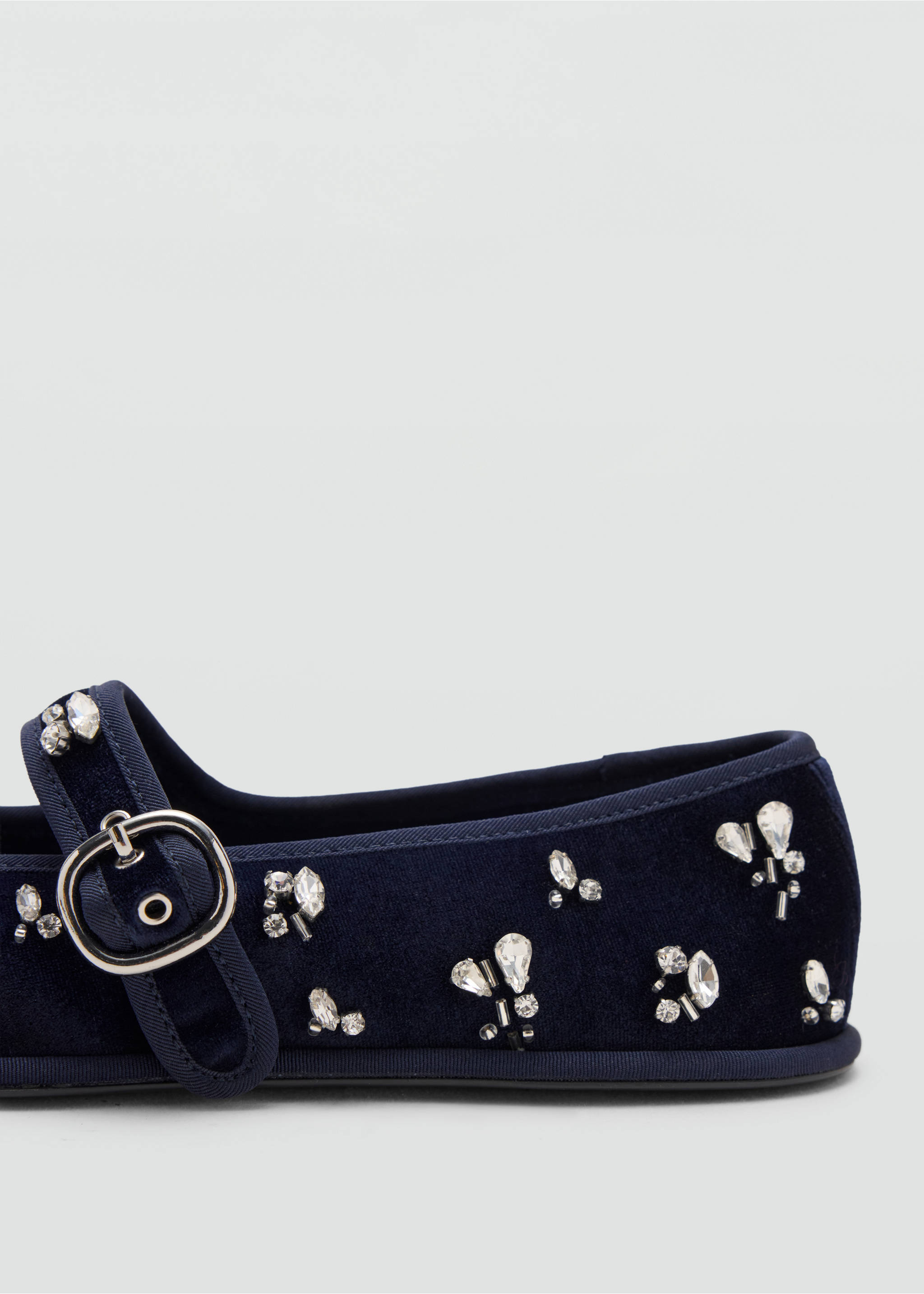 Close-up of a dark blue velvet shoe with crystal embellishments and a silver buckle., Night Blue. Ref: 37087909-00.