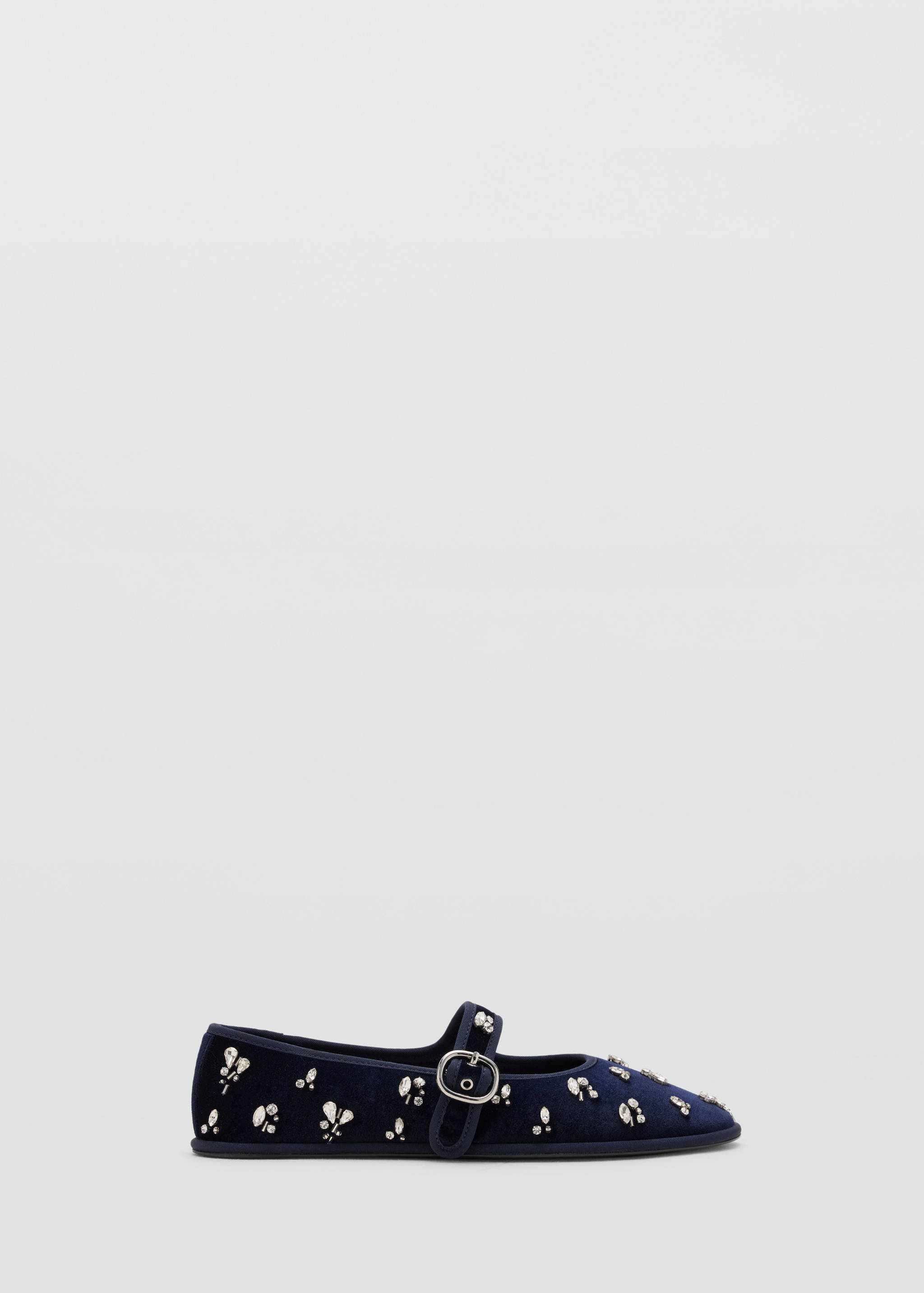 Dark navy blue velvet flat shoe with crystal embellishments and a buckled instep strap.