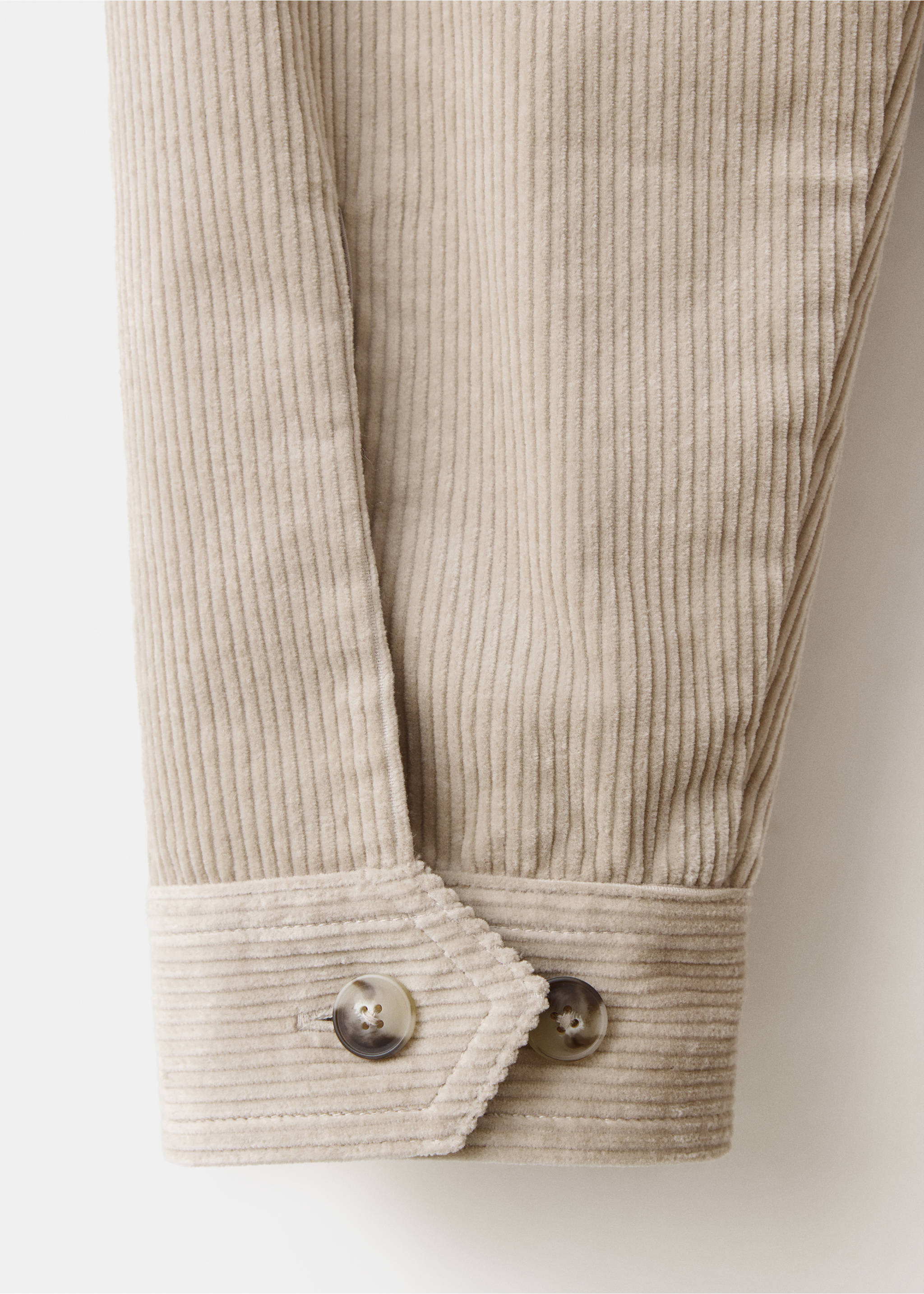 Close-up of a light beige corduroy overshirt sleeve and buttoned cuff., Light/Pastel Grey. Ref: 37087920-00.