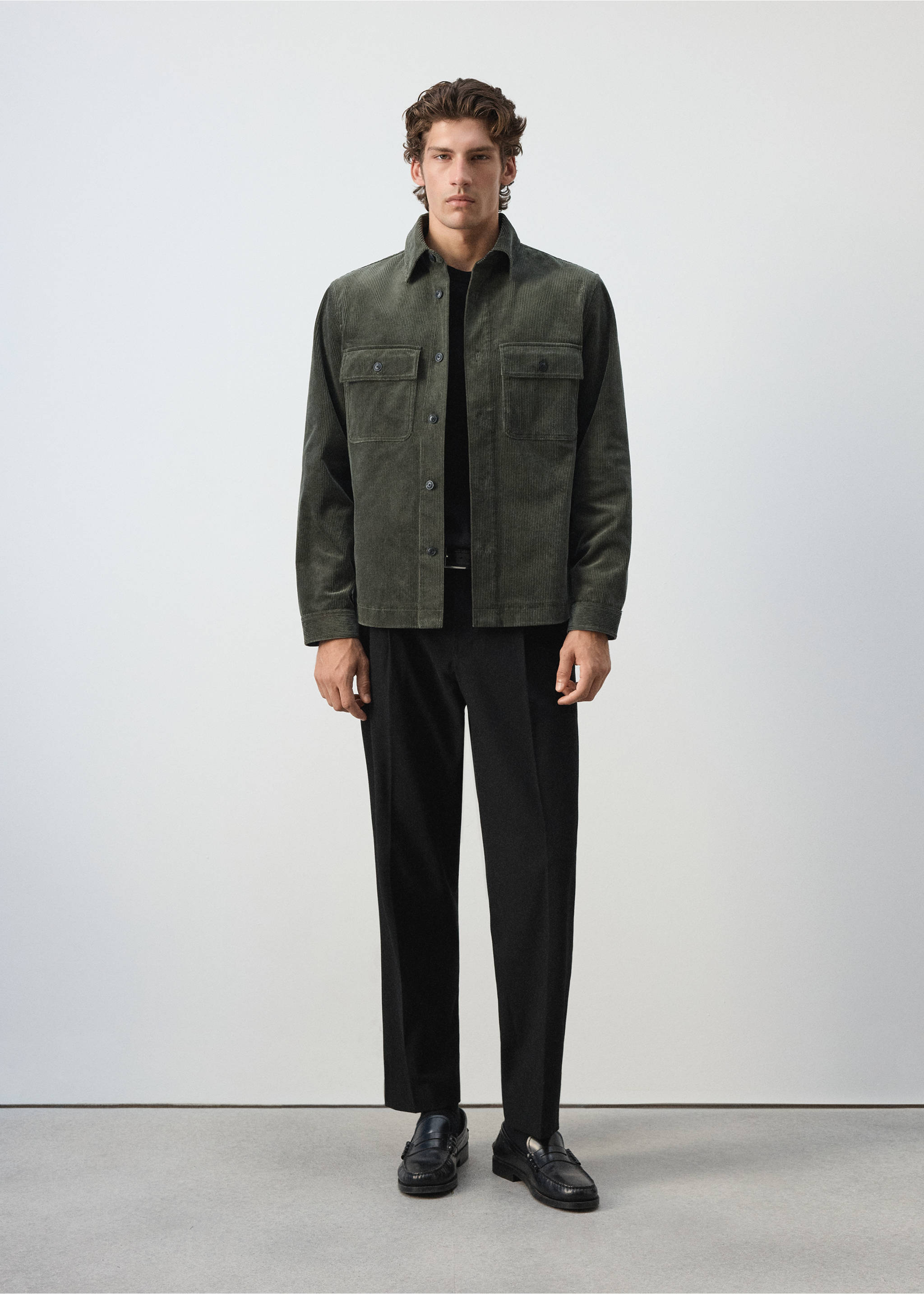 Dark green overshirt with a point collar and chest pockets, worn with black trousers., Dark Green. Ref: 37087920-00.