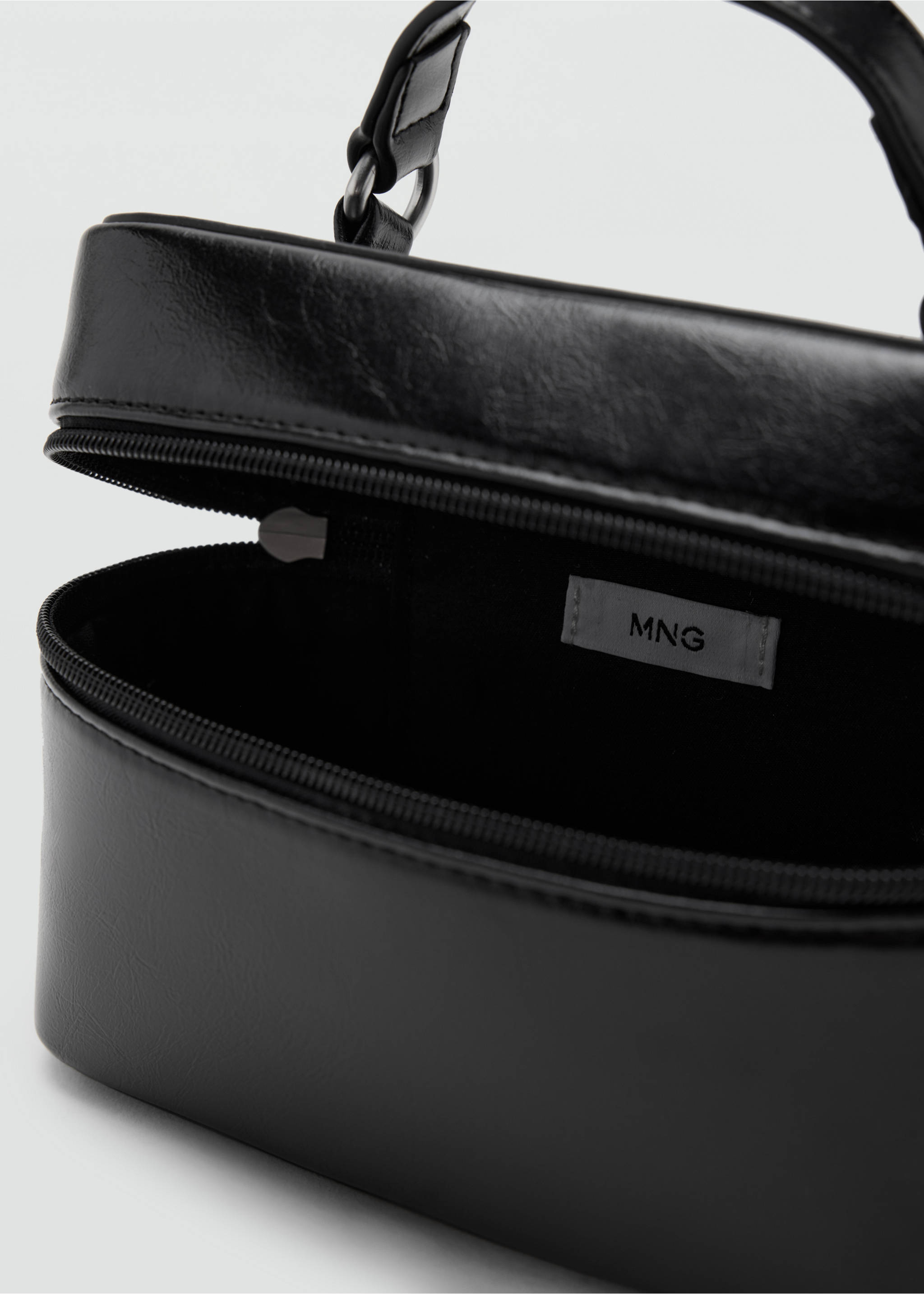 Black structured mini bag detail, shown open., Black. Ref: 37087930-00.