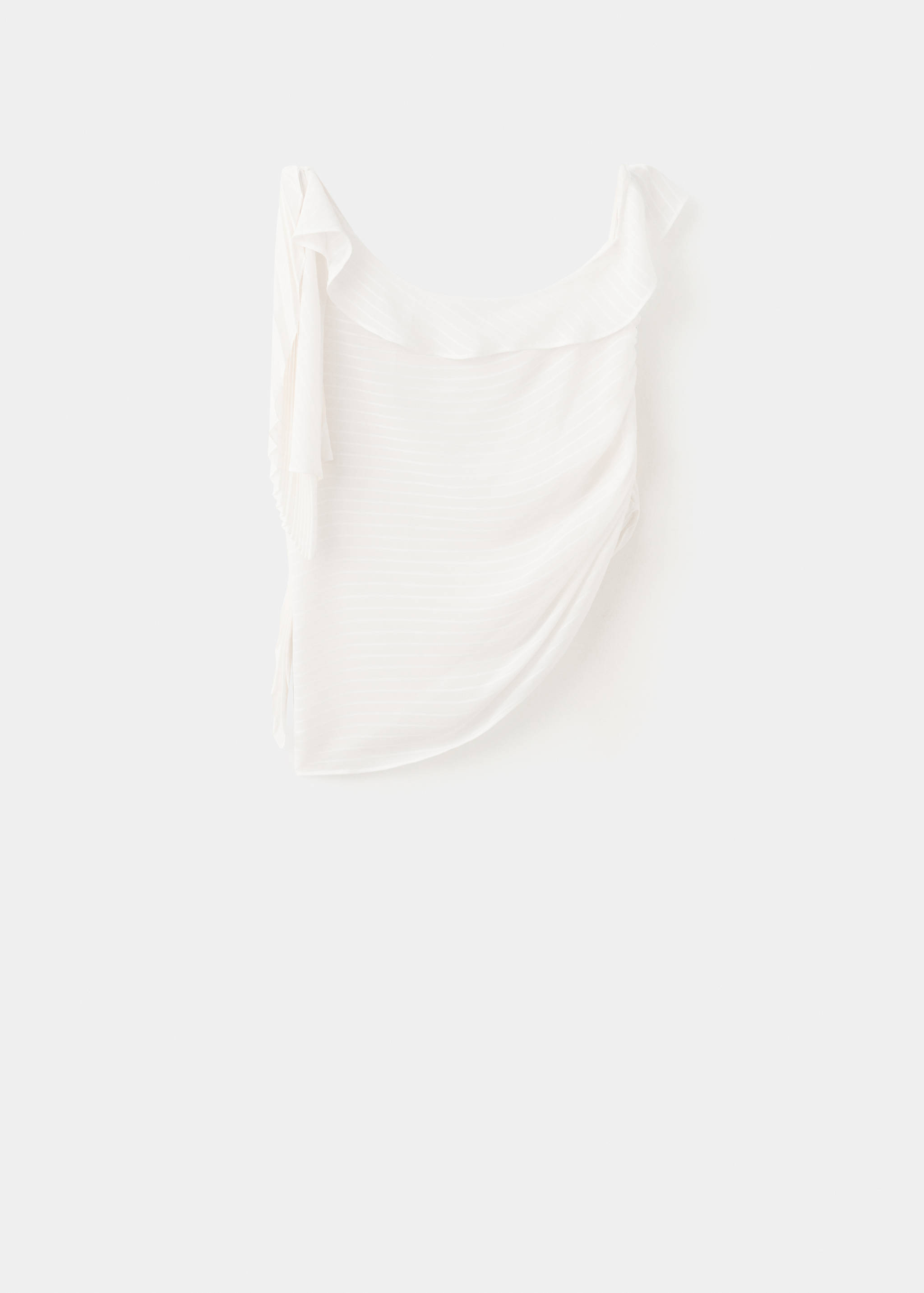 White off-the-shoulder top with a ruffled neckline and draped texture.