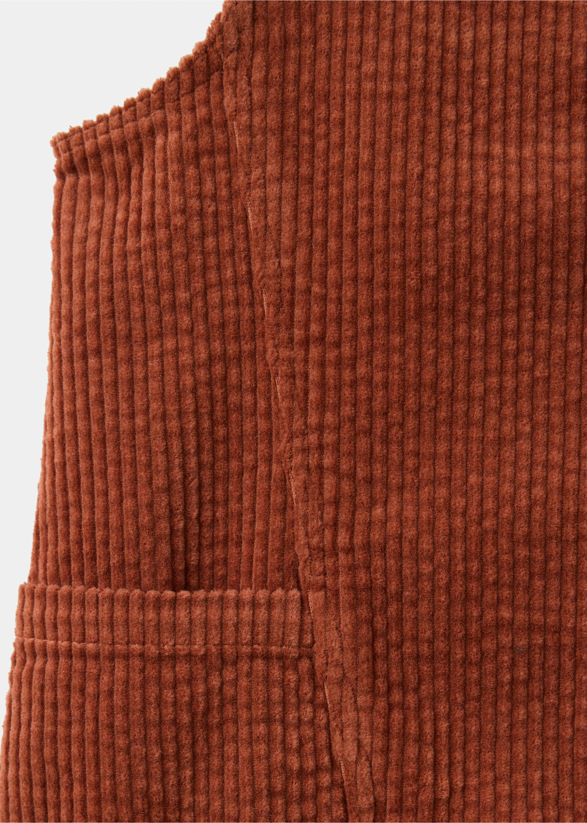 Close-up of brown corduroy pinafore fabric showing texture., Russet. Ref: 37088270-00.
