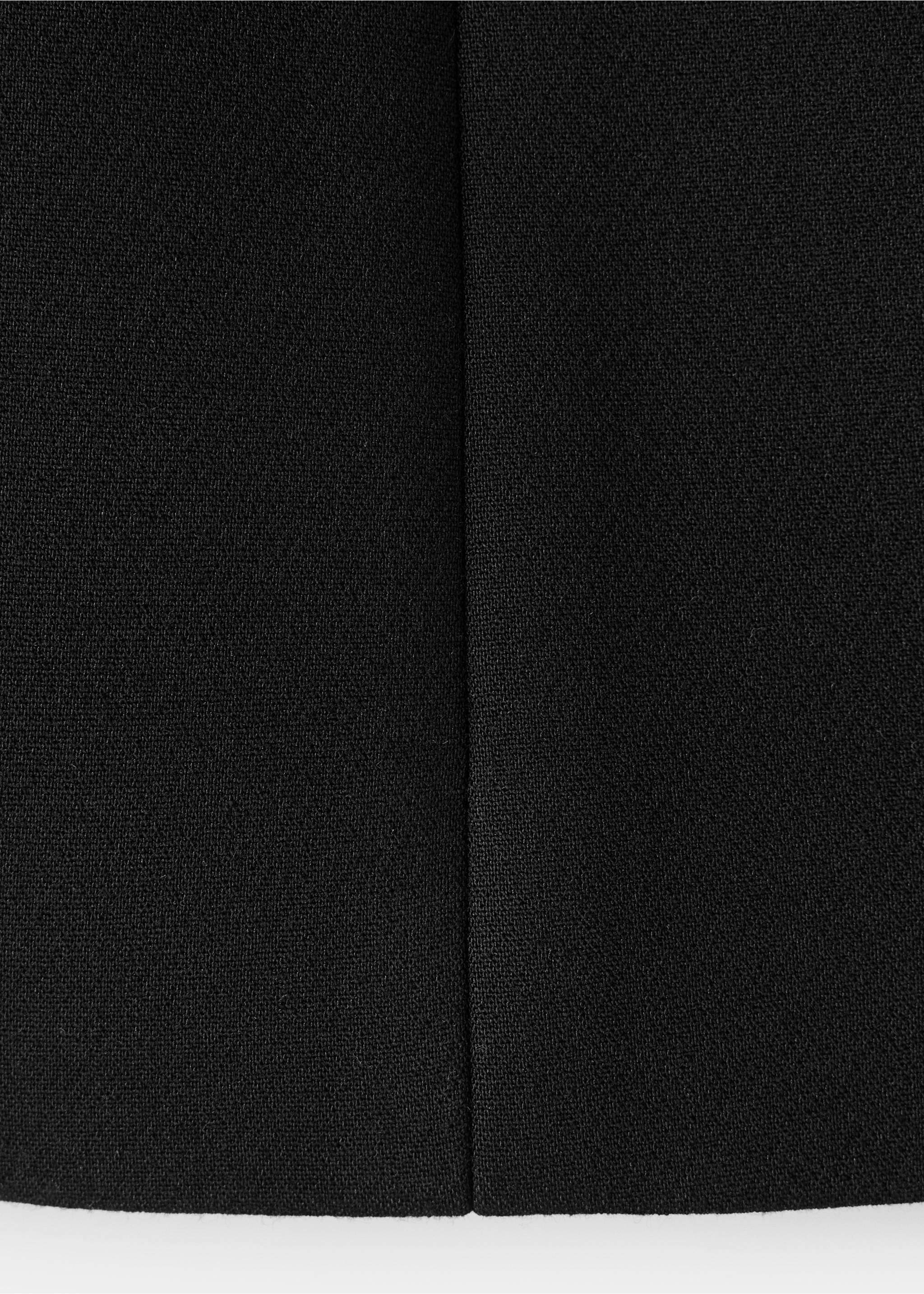 Close-up of the black woven fabric texture on a waistcoat., Black. Ref: 37088271-00.